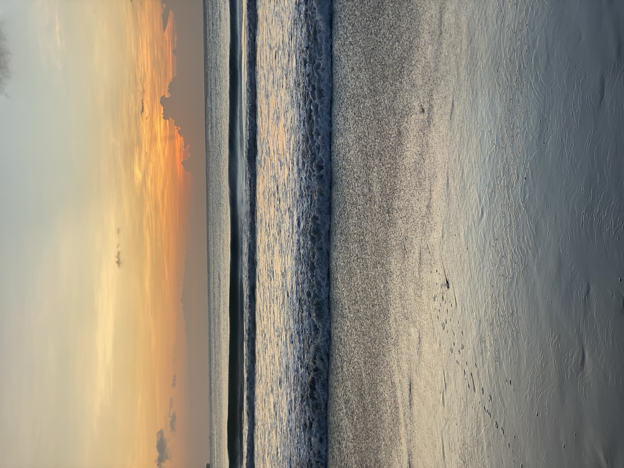 Sunset beach leisure activities captured at Kuta Selatan, Indonesia