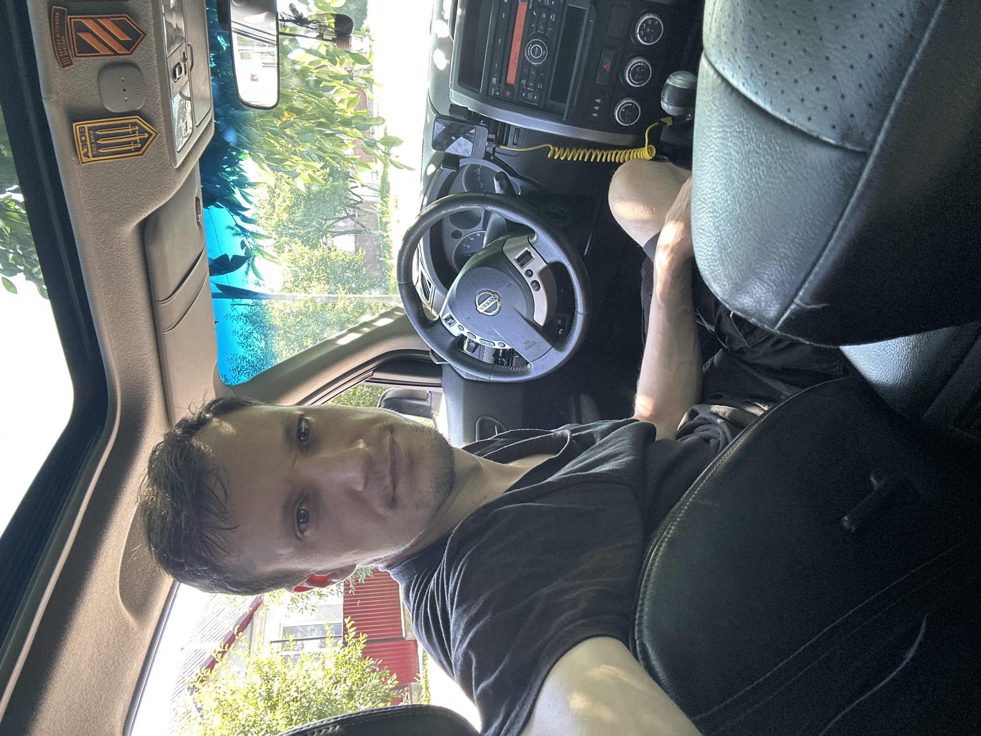 Driver's seat selfies in Shatava, sunroof open, trident decal in view