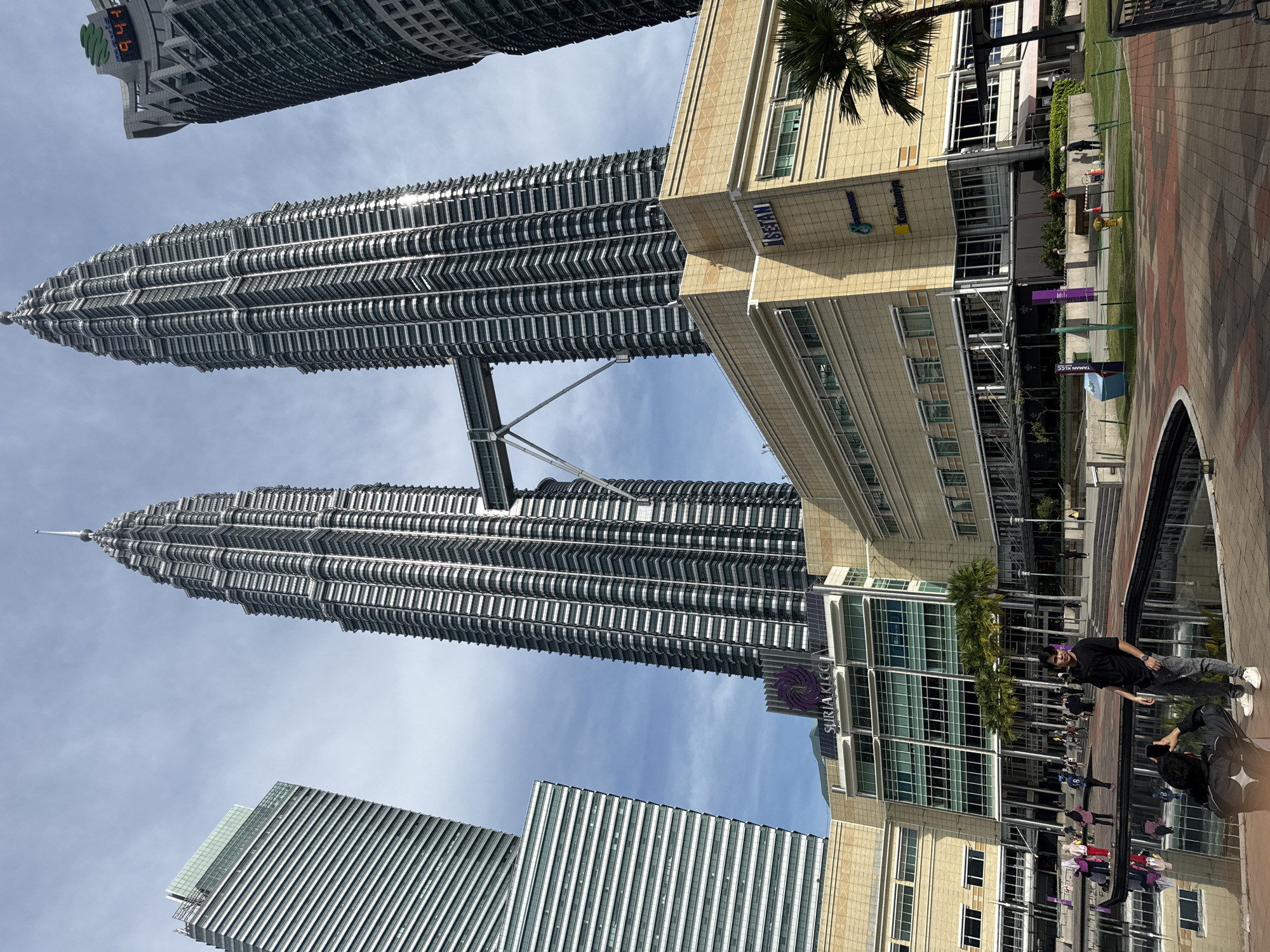 Late night tourist activity captured at Petronas Towers complex