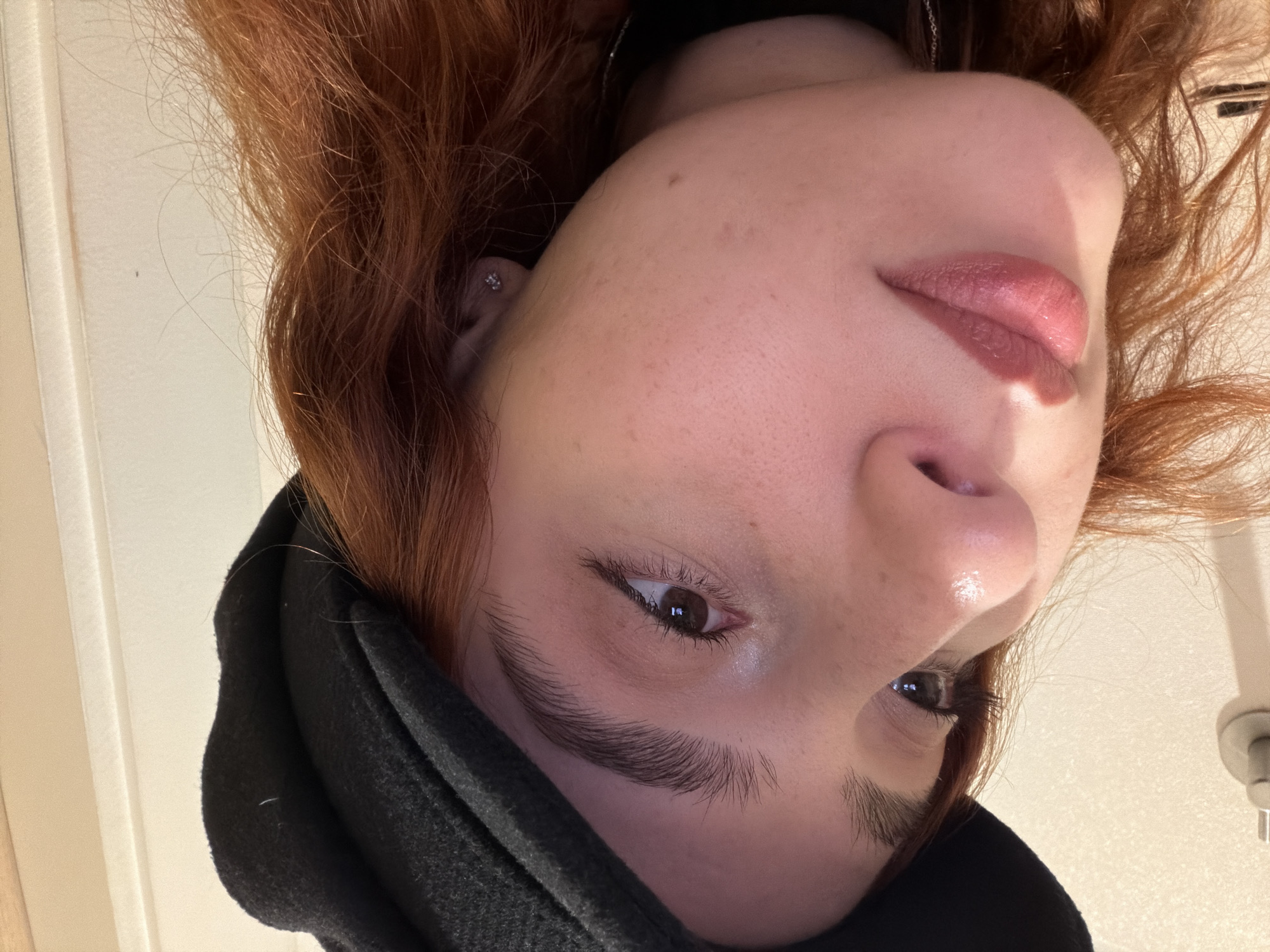 Person with reddish-brown hair photographed in Strasbourg