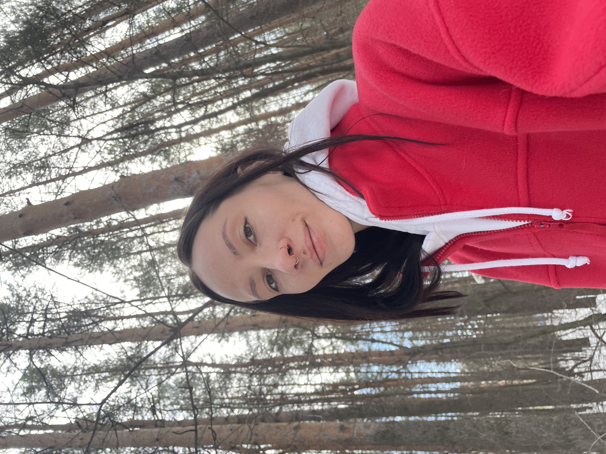 Woman takes forest selfies in snowy Izhevsk morning