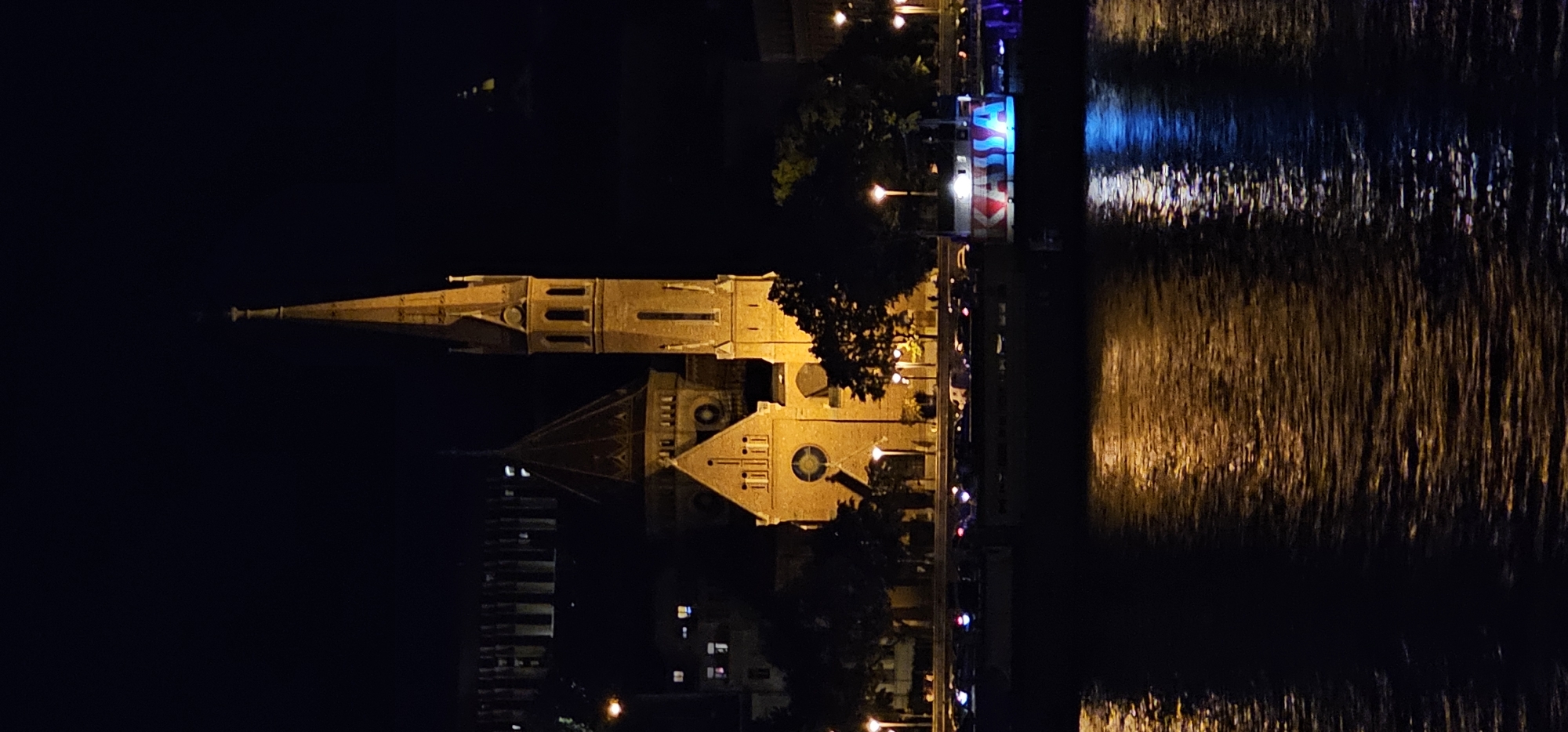 Budapest at night: Parliament, Matthias Church, and the Shoes memorial