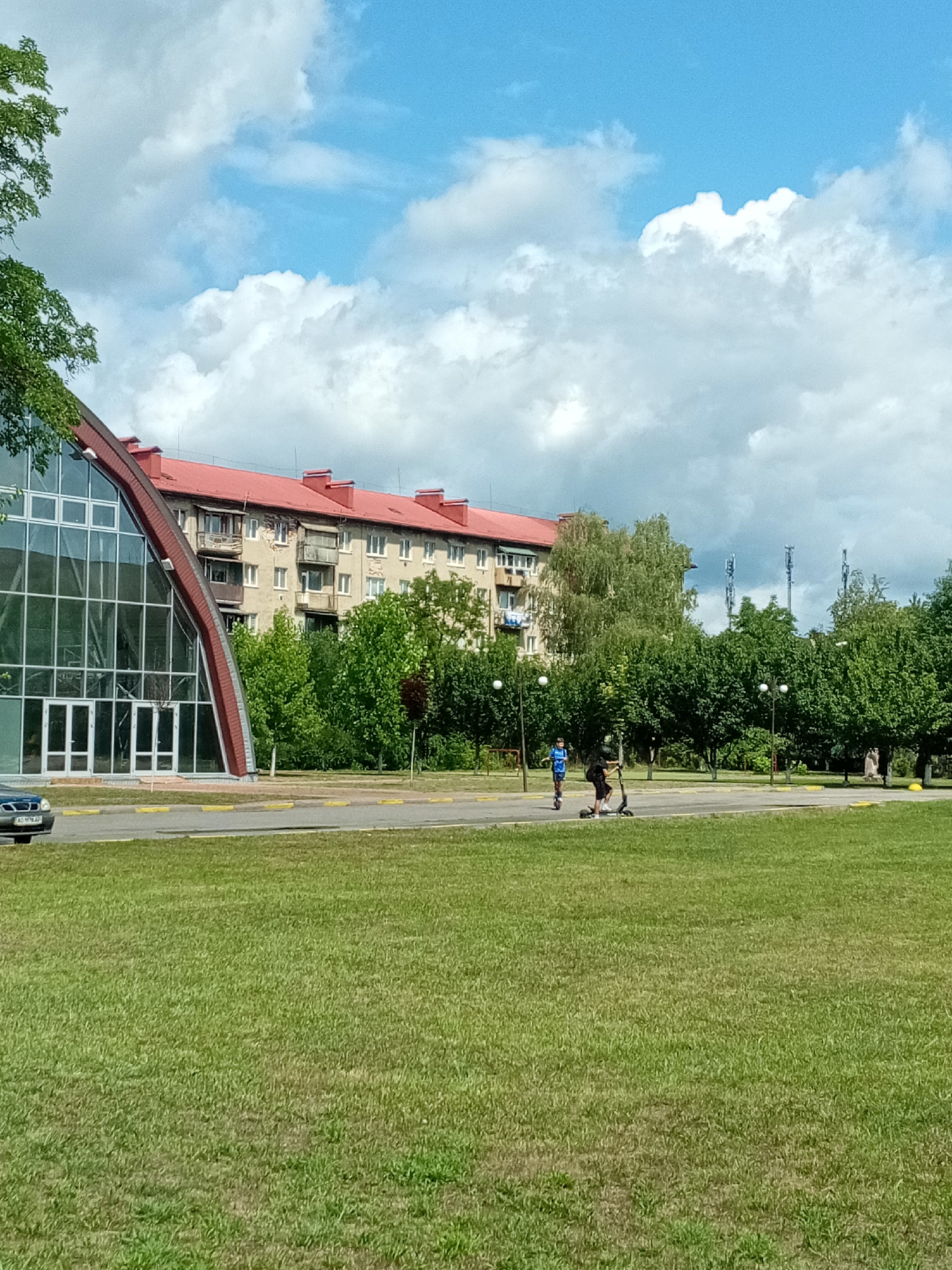Tiachiv streets, clinics, and solar-paneled buildings on a July morning