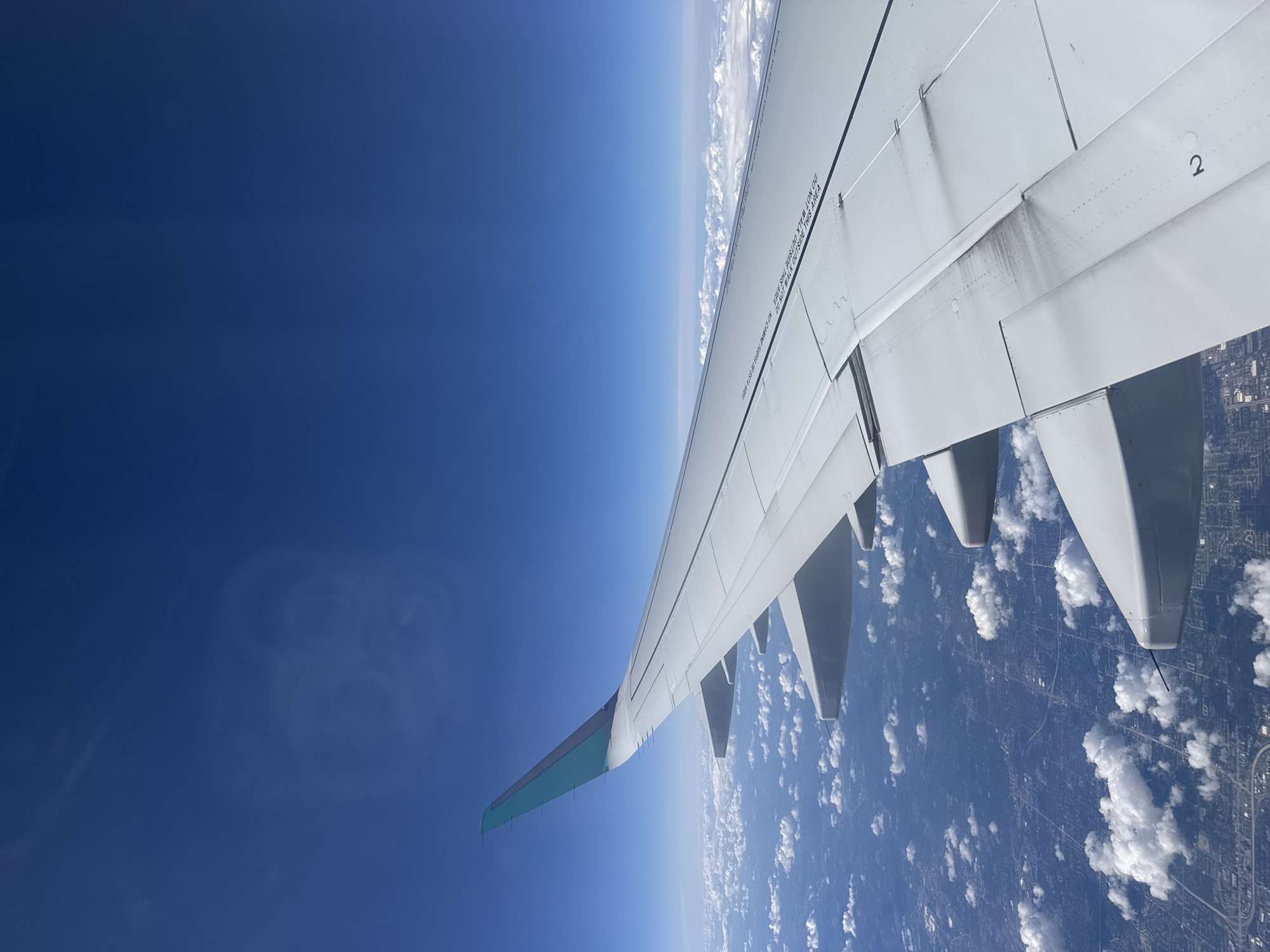 Window seat views over suburban Michigan, mid-flight