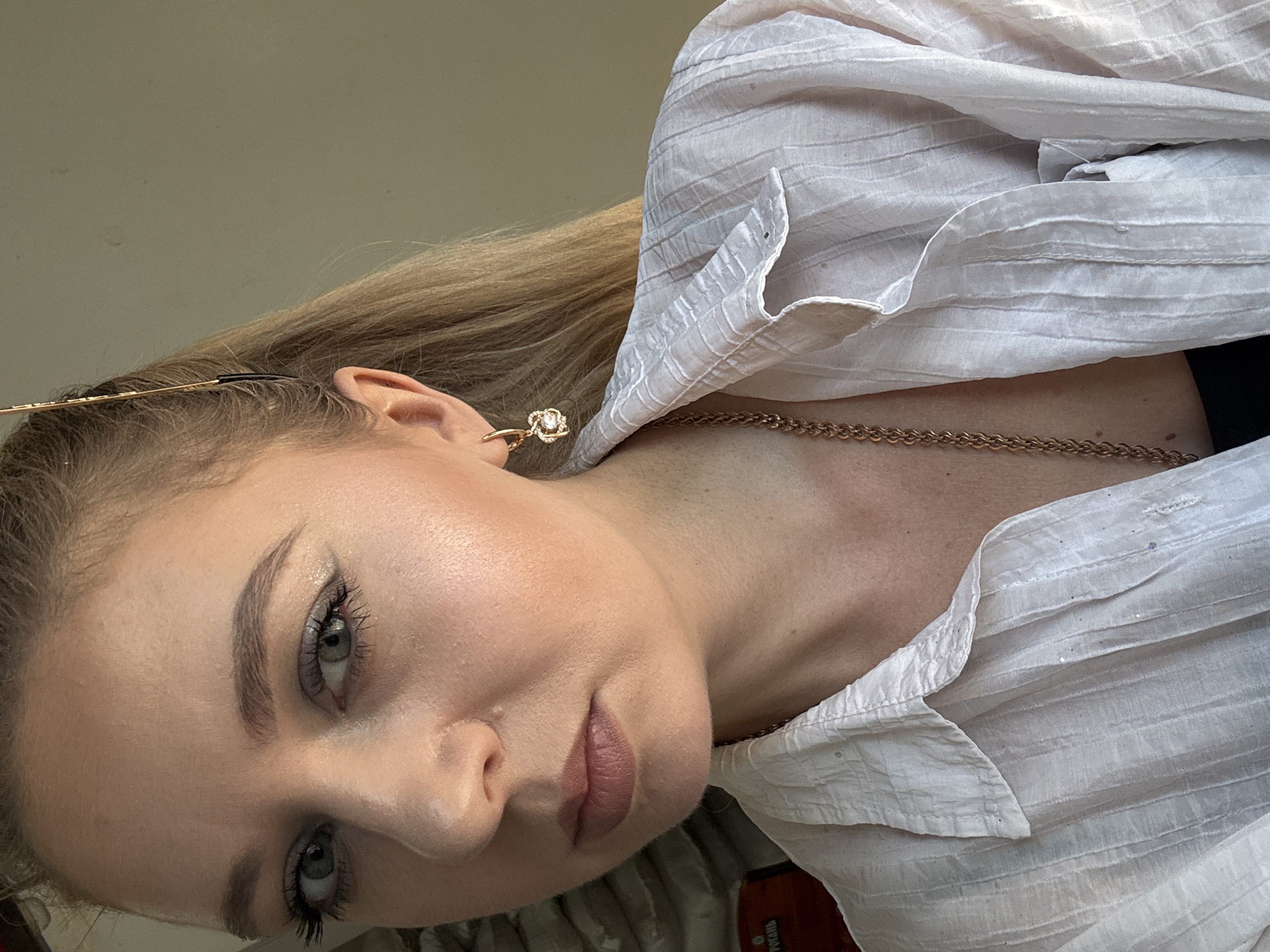 A selfie session across indoor and outdoor spots, consistent look throughout