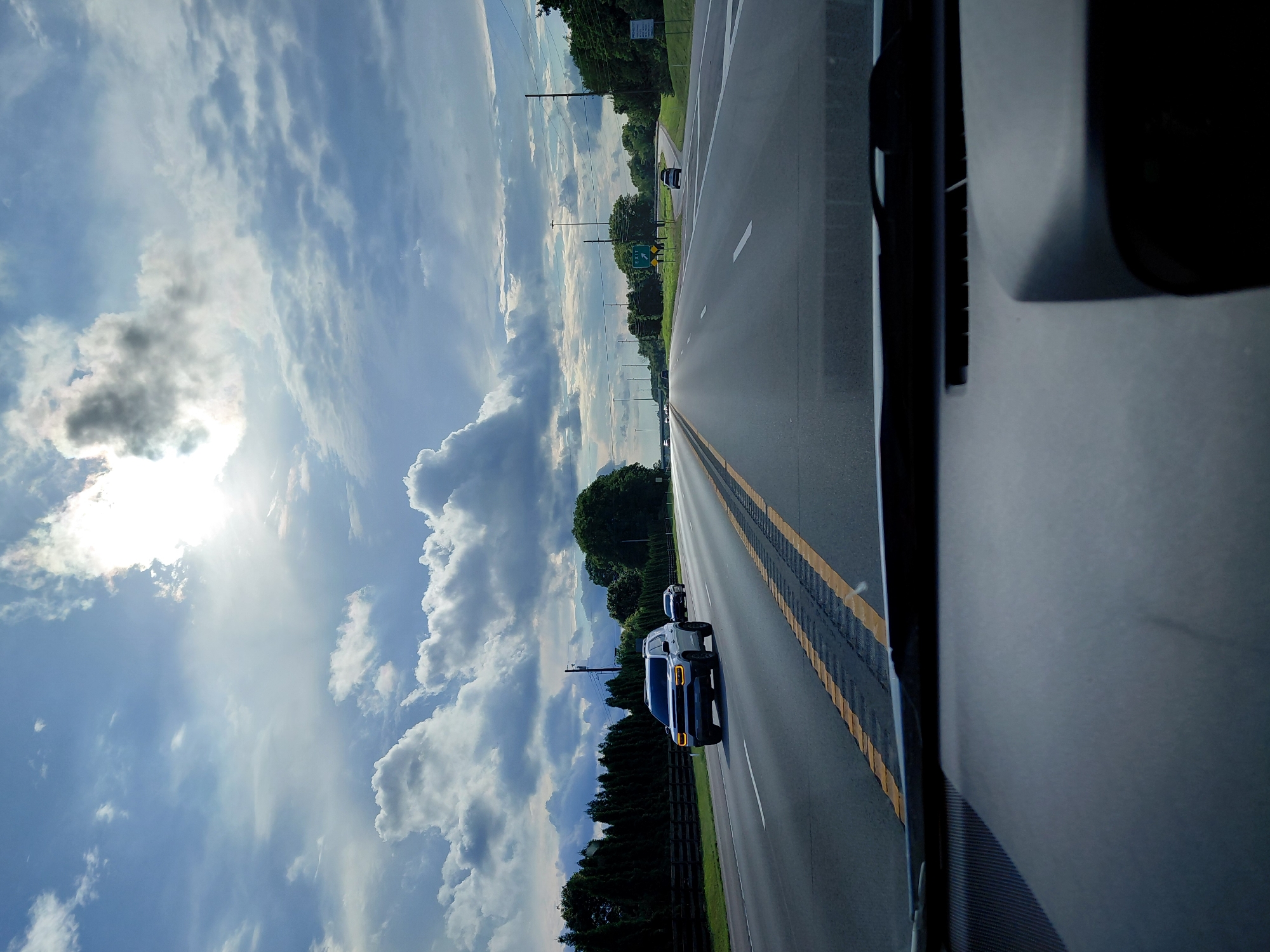 Dashboard view of a multi-lane highway outside Versailles, Kentucky