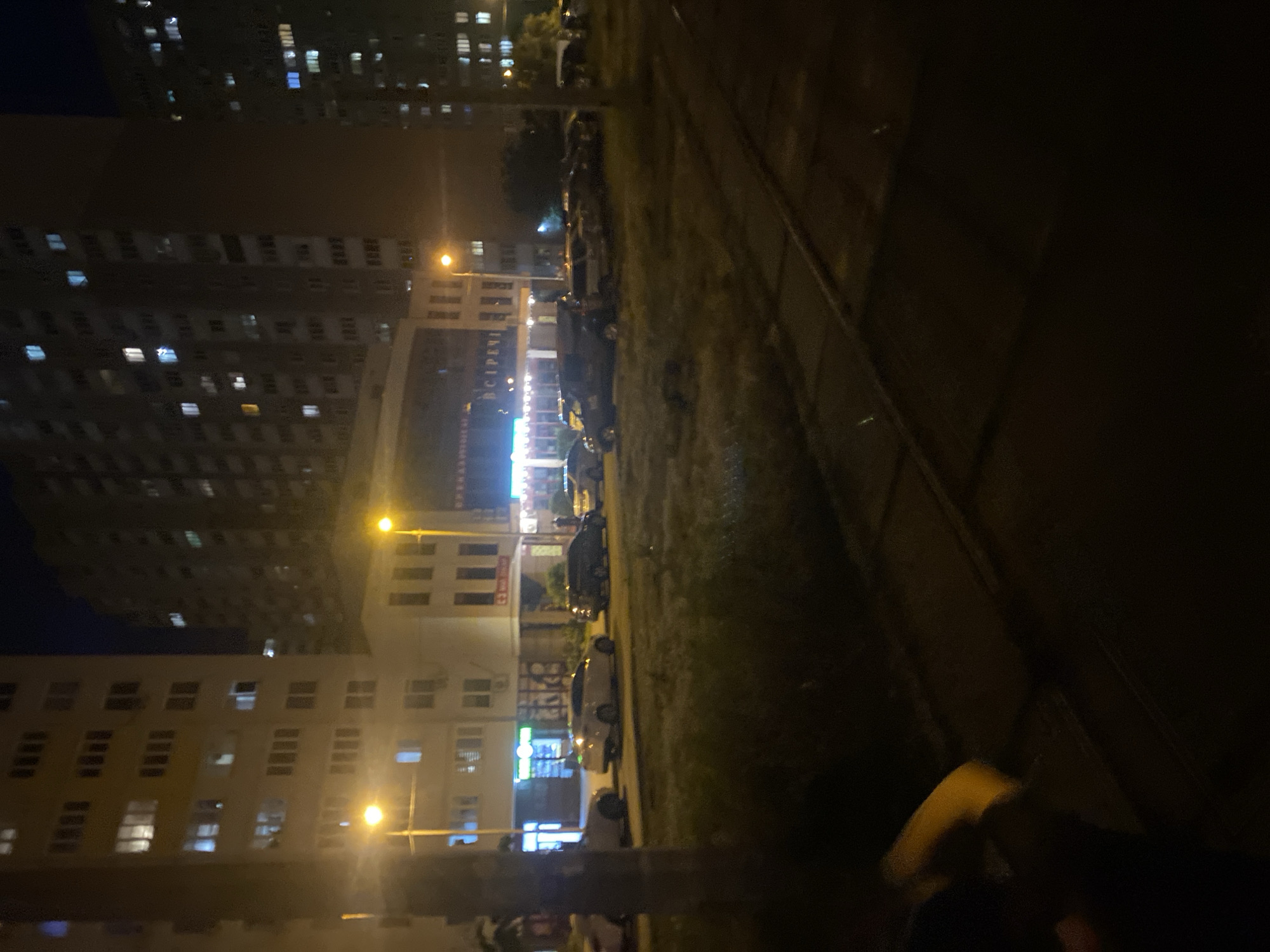 Nighttime street scene near a Kyiv residential block