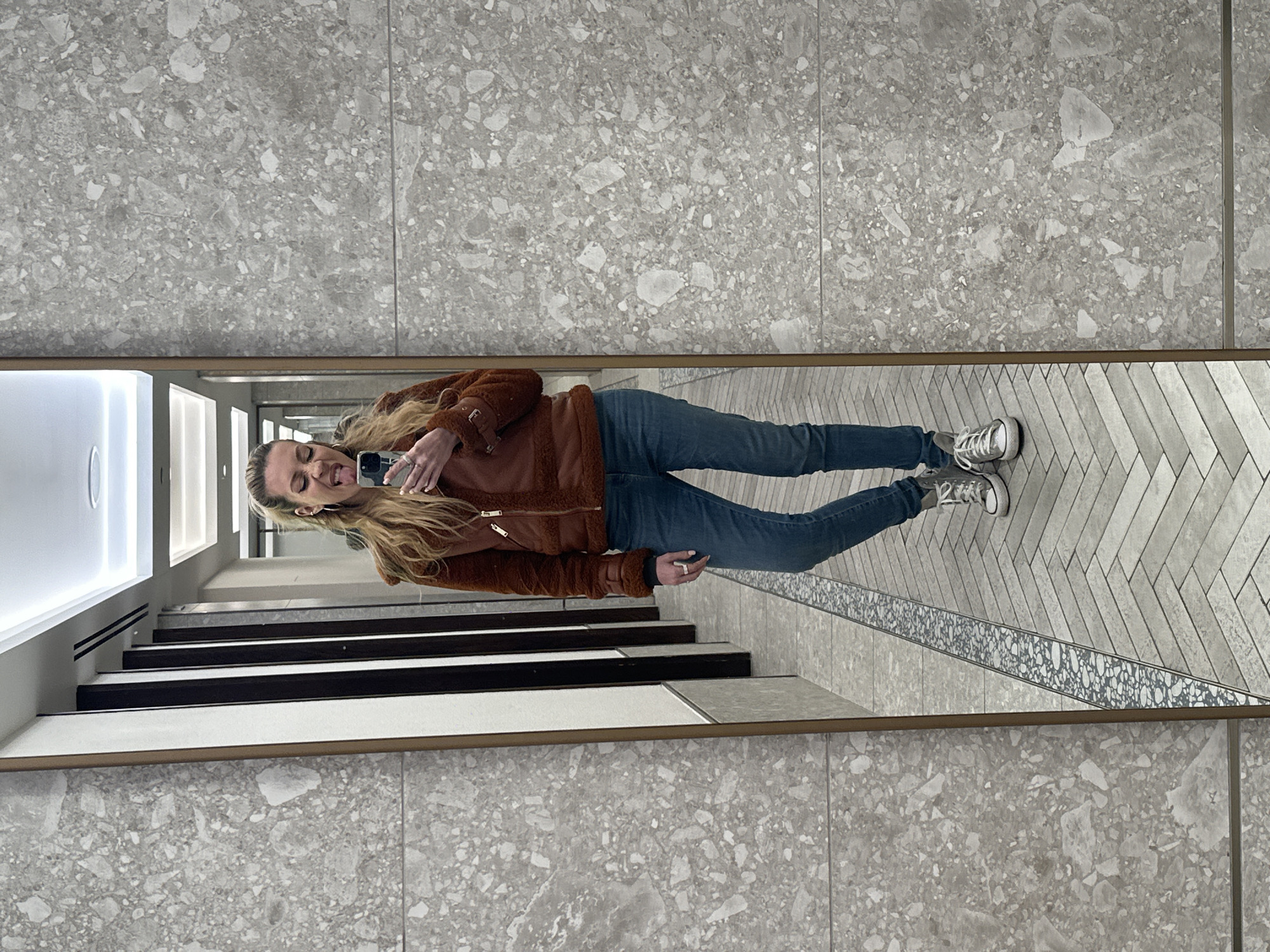 Woman takes playful bathroom selfies in Dartford