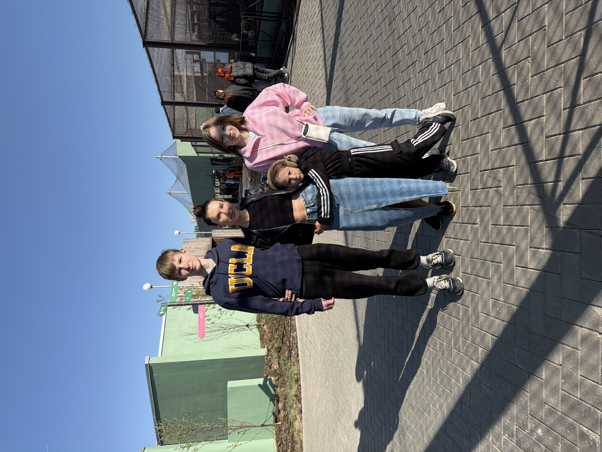 Family visits zoo enclosure in Perm, Russia