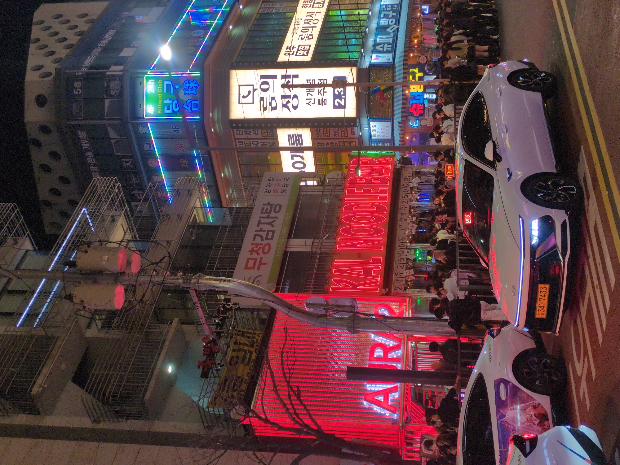Seoul's illuminated nightlife districts documented in evening observations