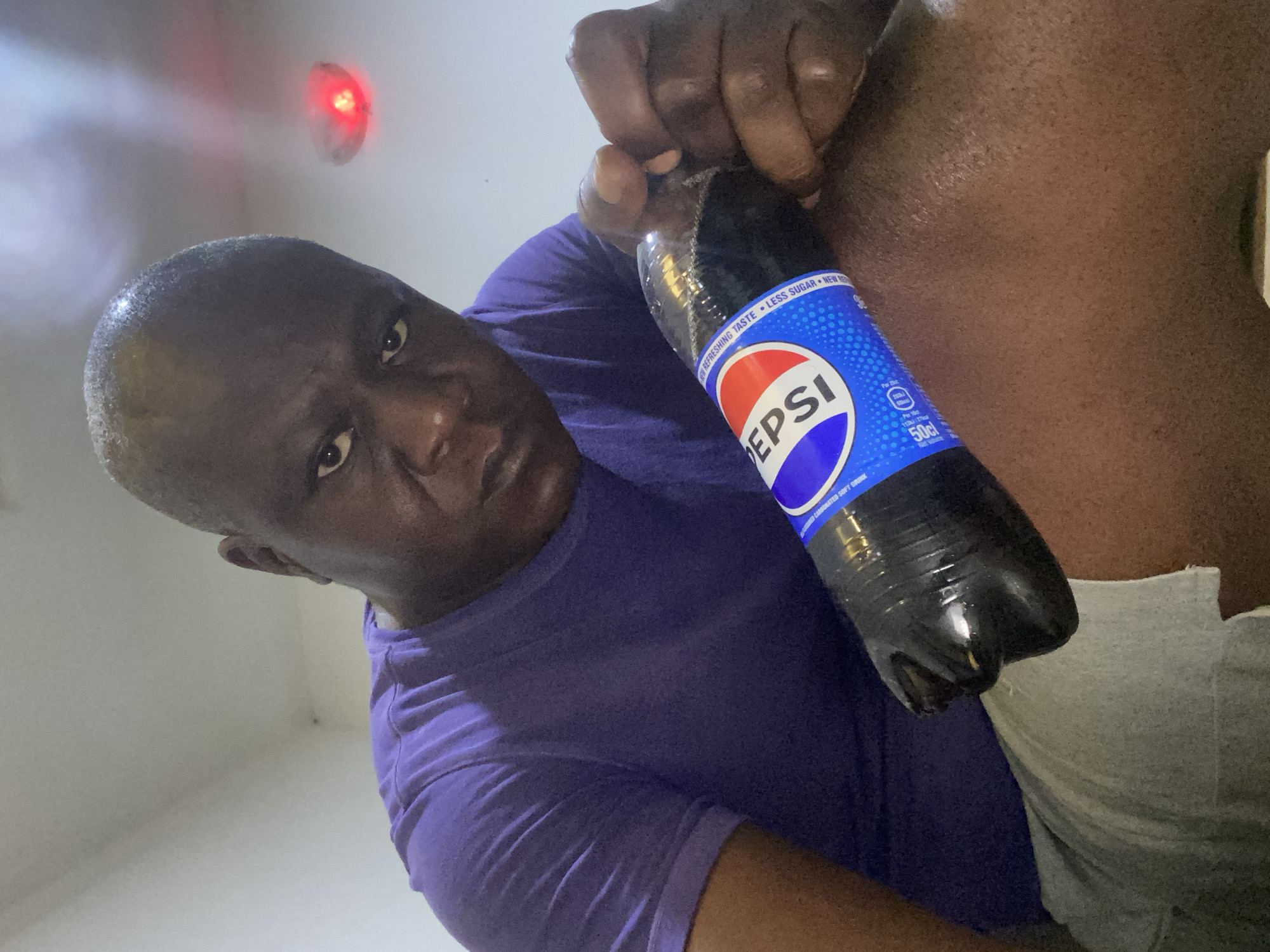 Man photographed relaxing with drinks at home in Kubwa