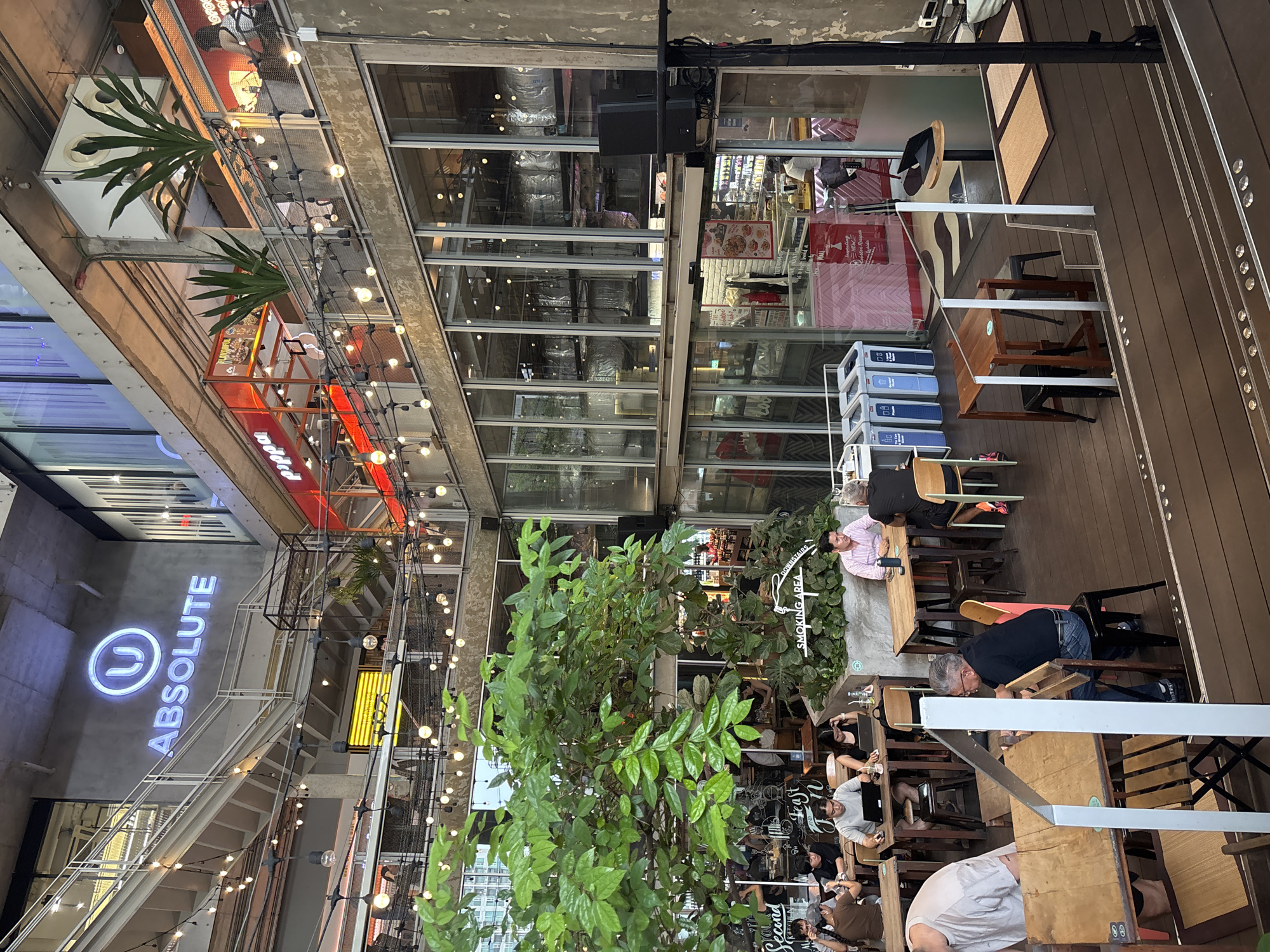 Morning dining activity documented at Bangkok commercial complex