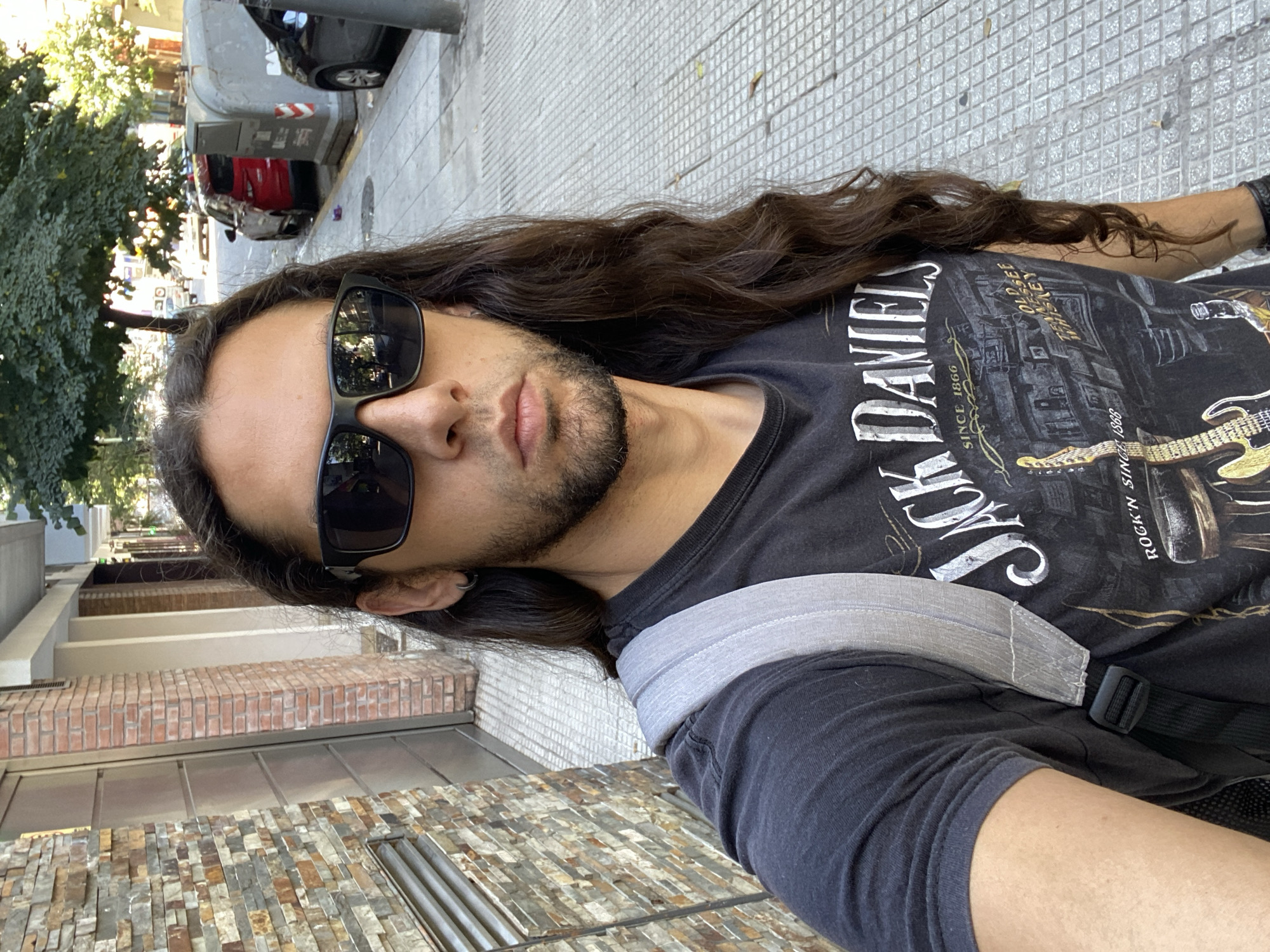 Man takes selfie wearing Jack Daniel's shirt in Buenos Aires