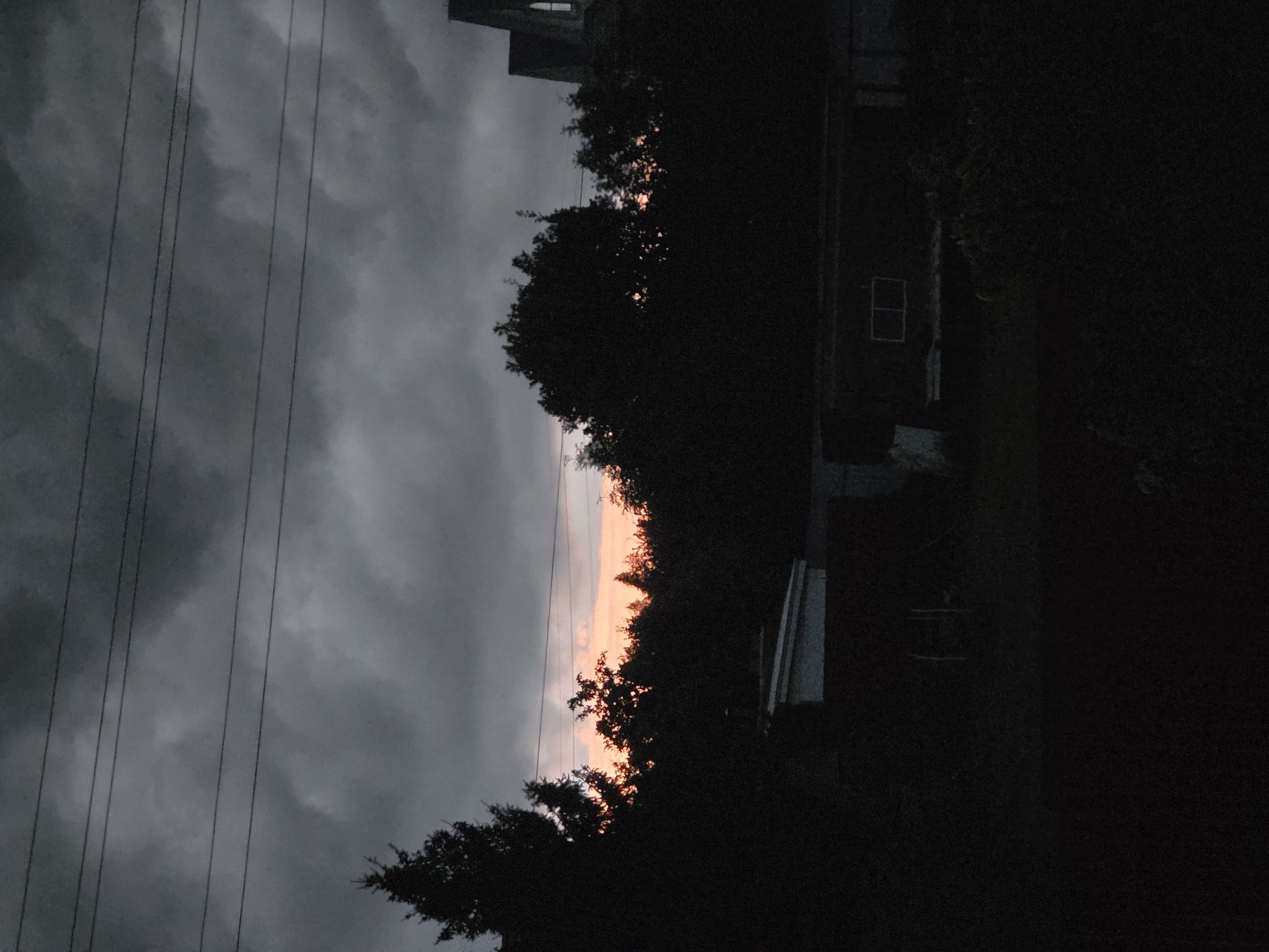 Storm clouds gather over a residential neighborhood in Frolovo, Russia