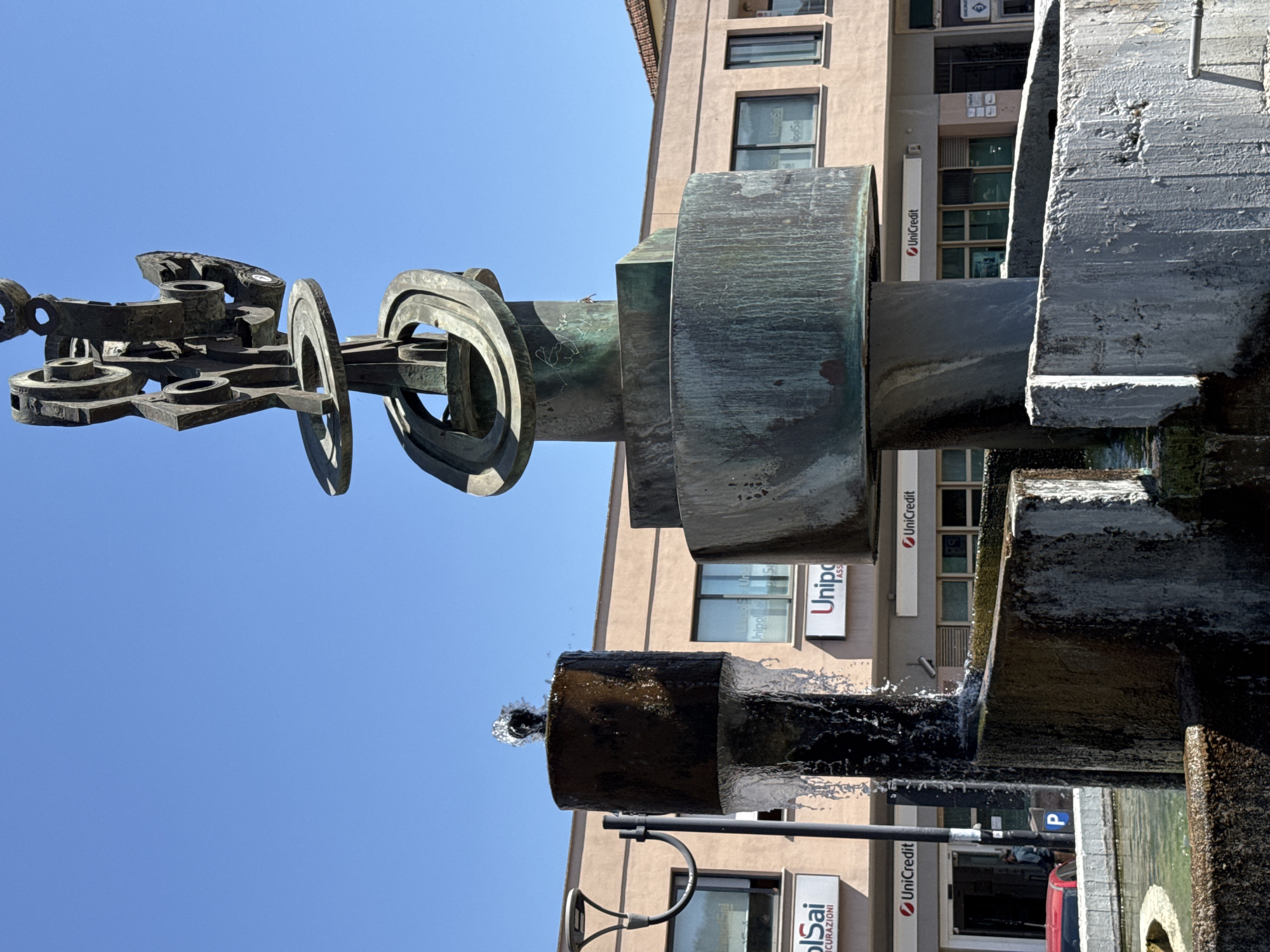 Morning life unfolds in Aprilia's public squares and streets