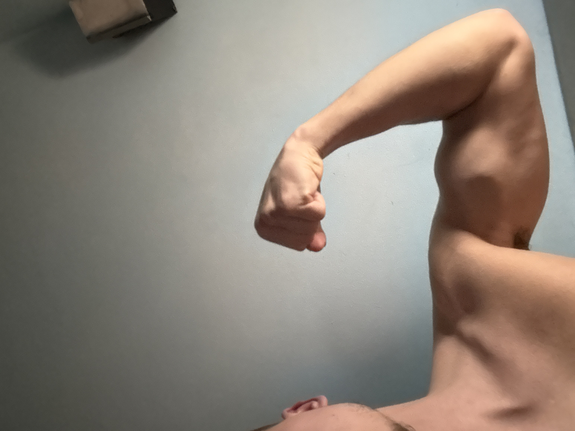 Person flexes arm for photos in Buhovo, Bulgaria