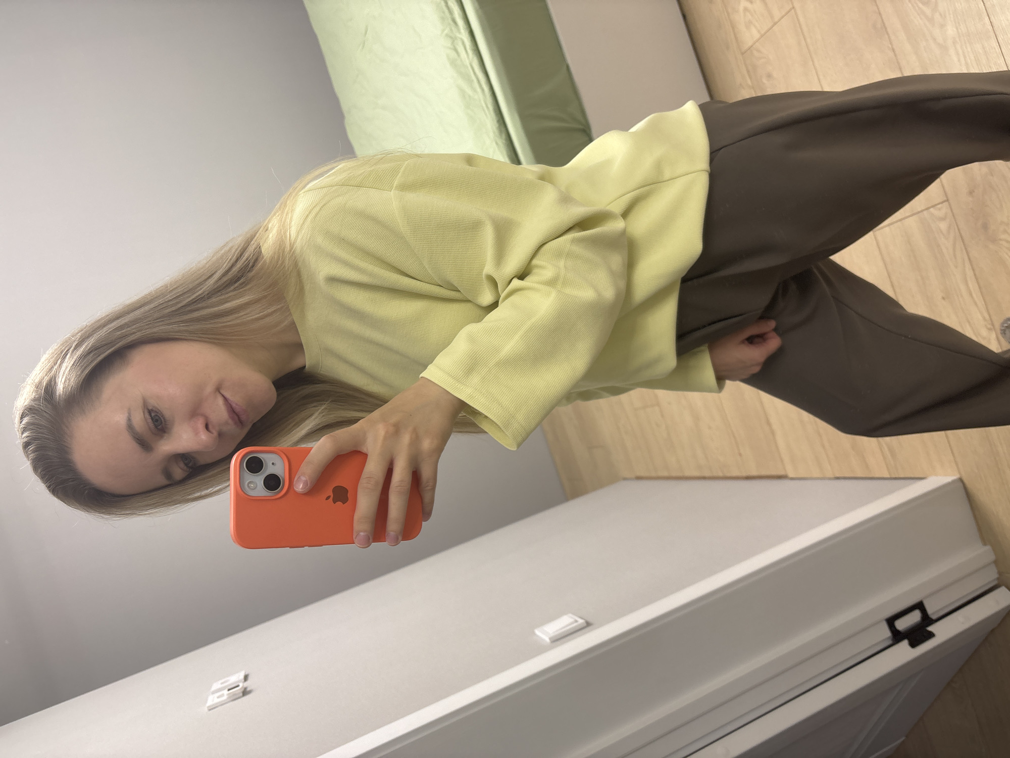 Woman takes indoor mirror selfies in Chaikovsky, Russia