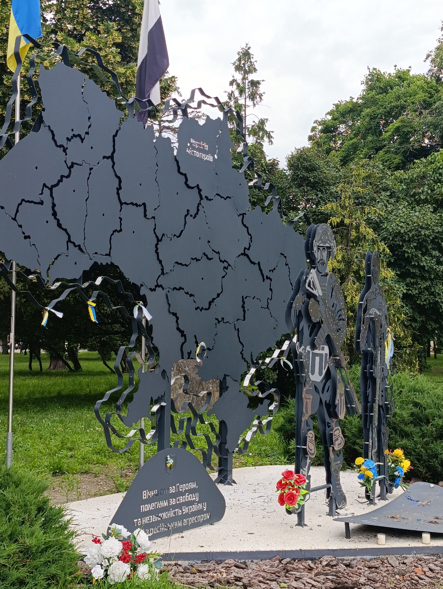 Morning park visit in Chernihiv with war memorial and flowers