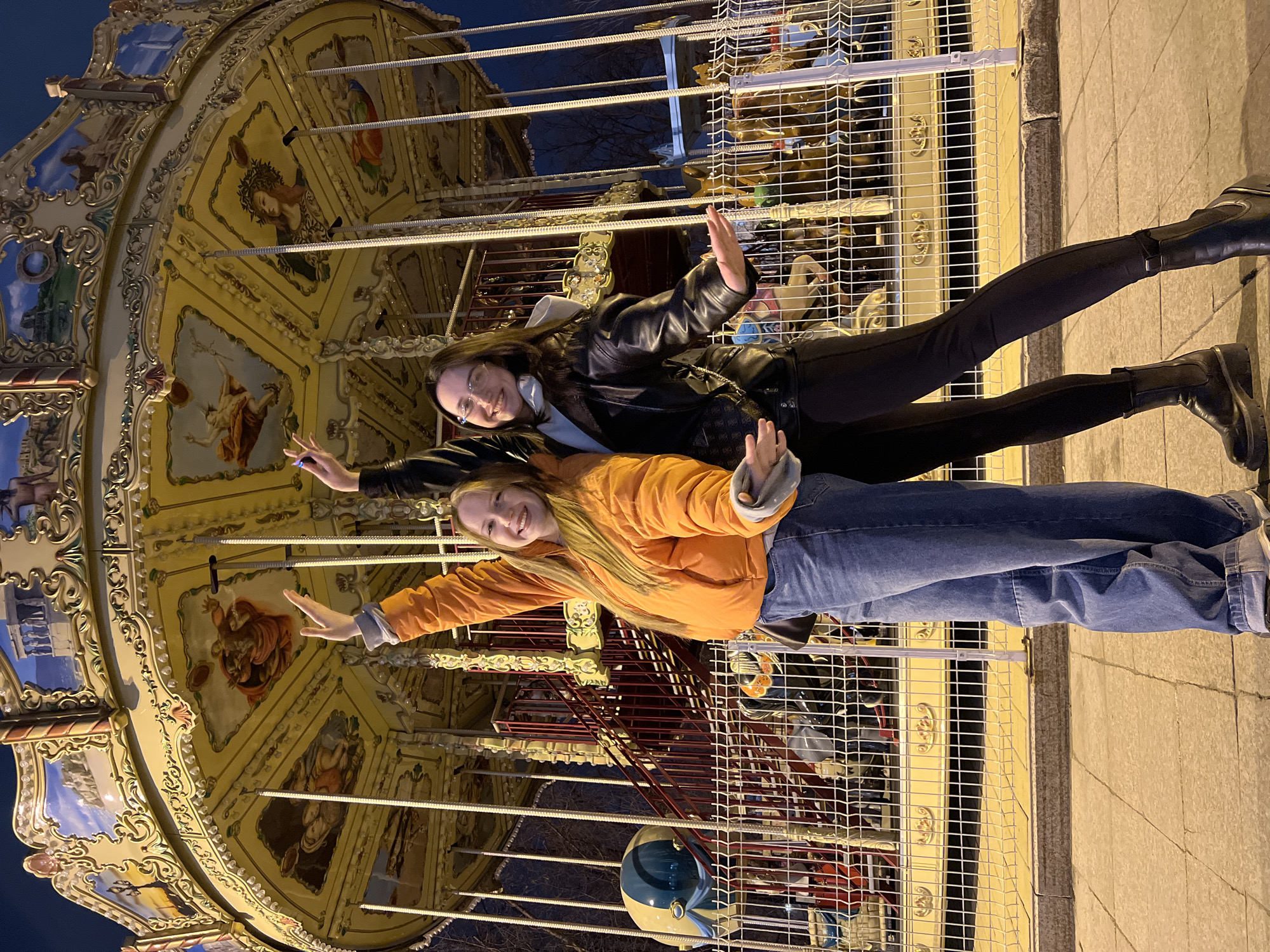Friends enjoy evening at illuminated amusement park in Tyumen