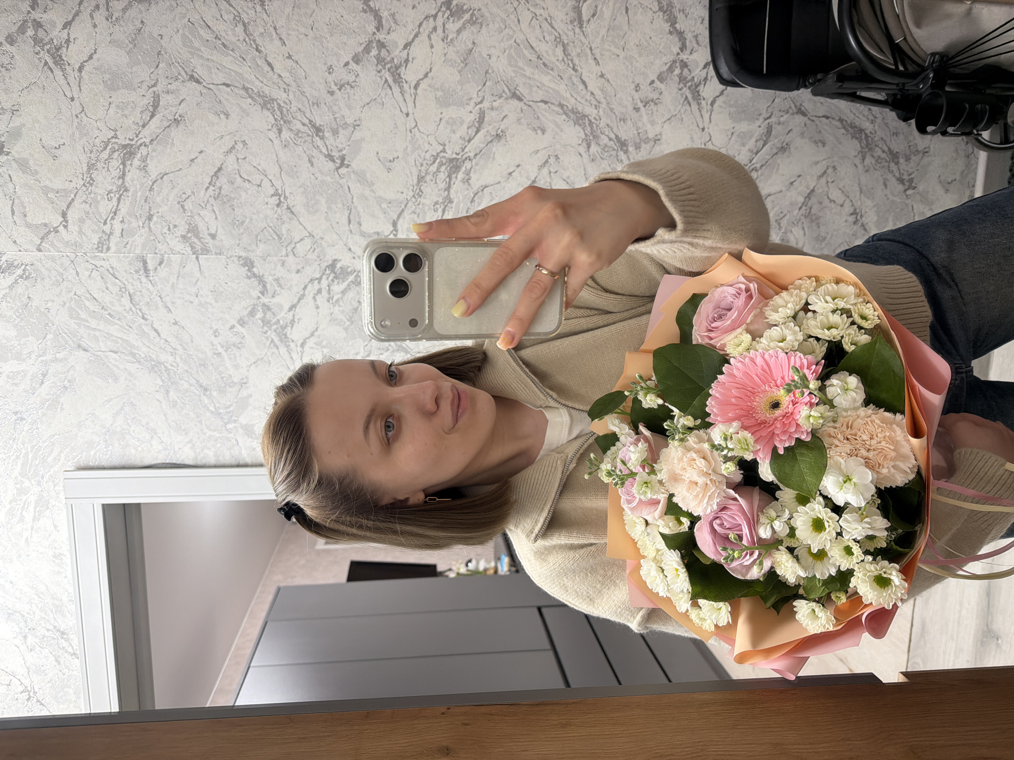 Woman documented with flowers, walking at night in Reshetnikovo