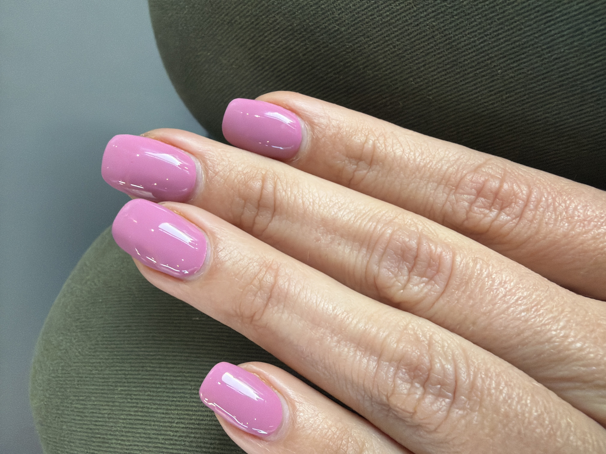 London witness captures studio shot of aged hand with pink manicure