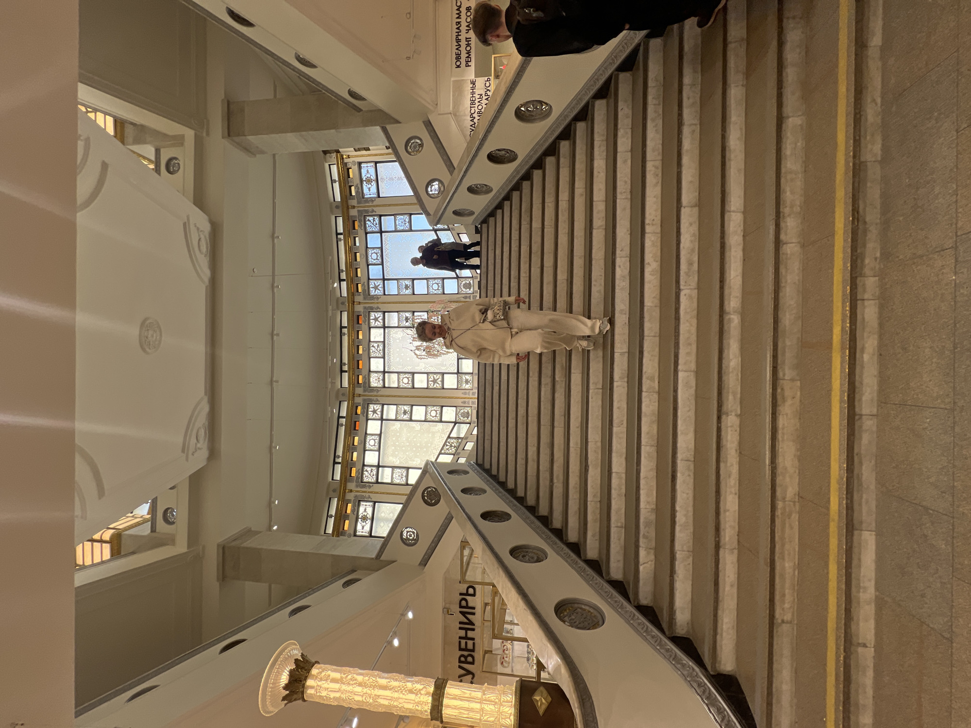 Shopper climbs stairs at Minsk's GUM department store