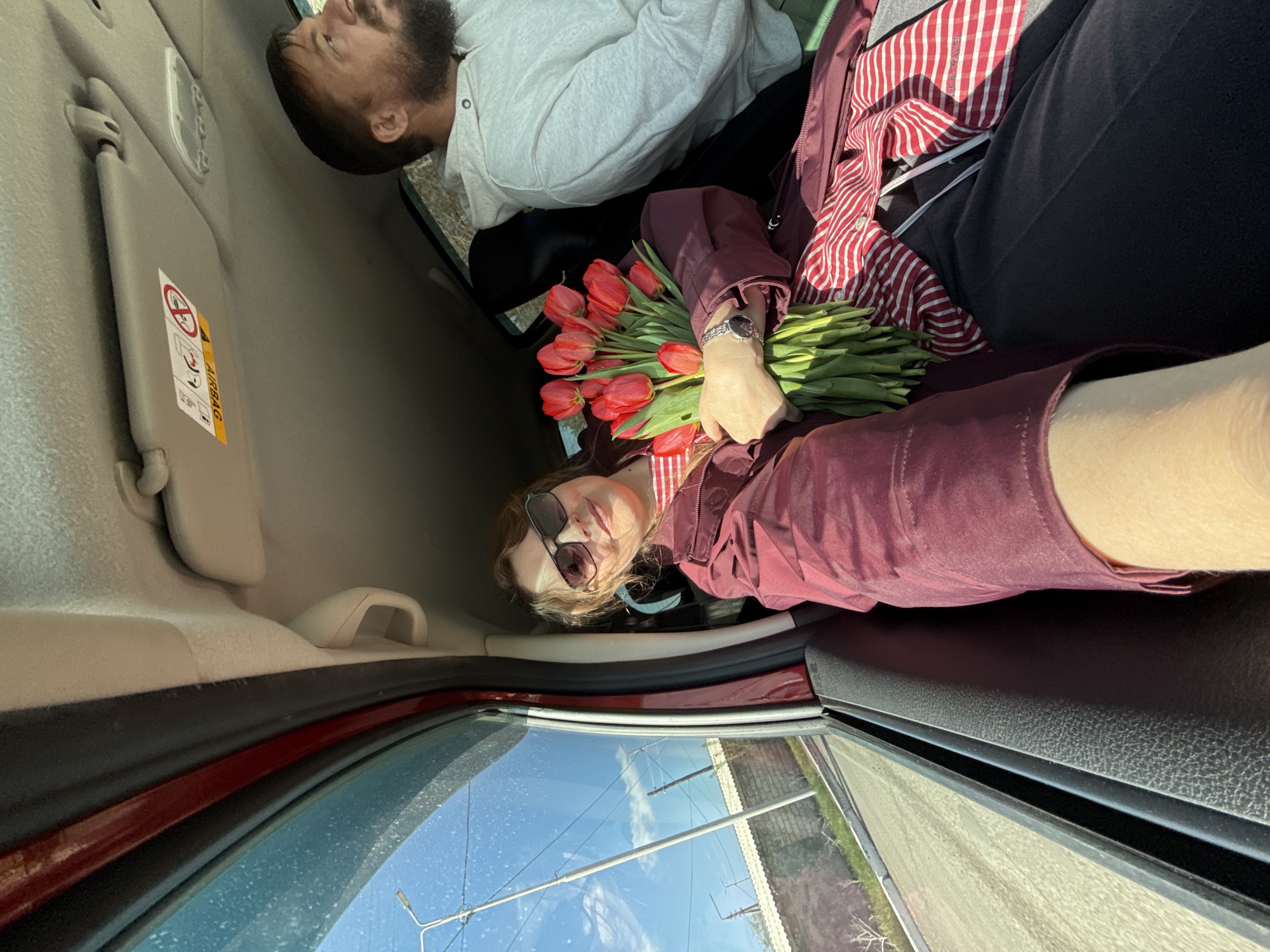 Car interior photographed with two people in Aksay, Kazakhstan