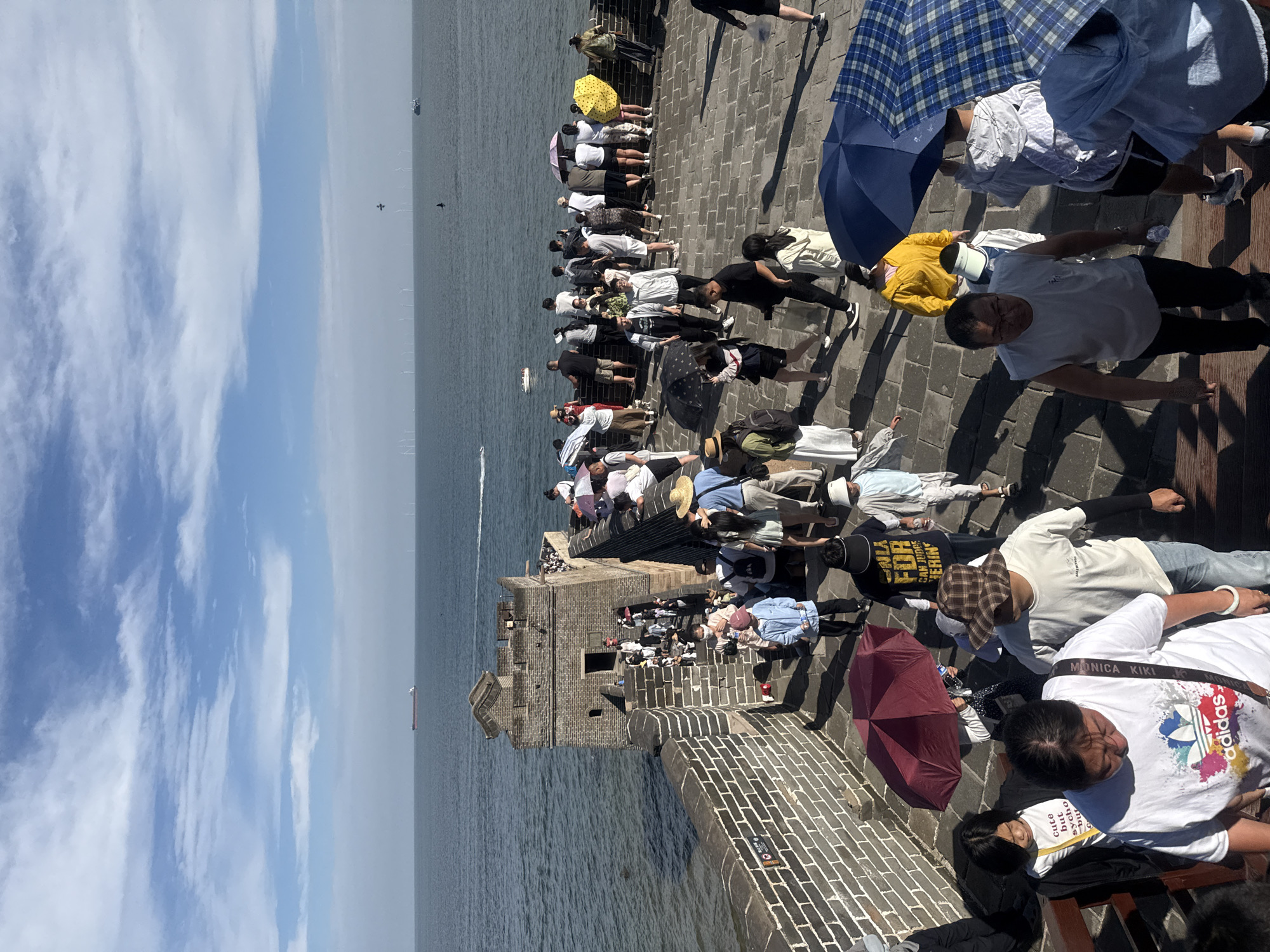 Great Wall meets the sea at Shanhaiguan on a busy summer morning