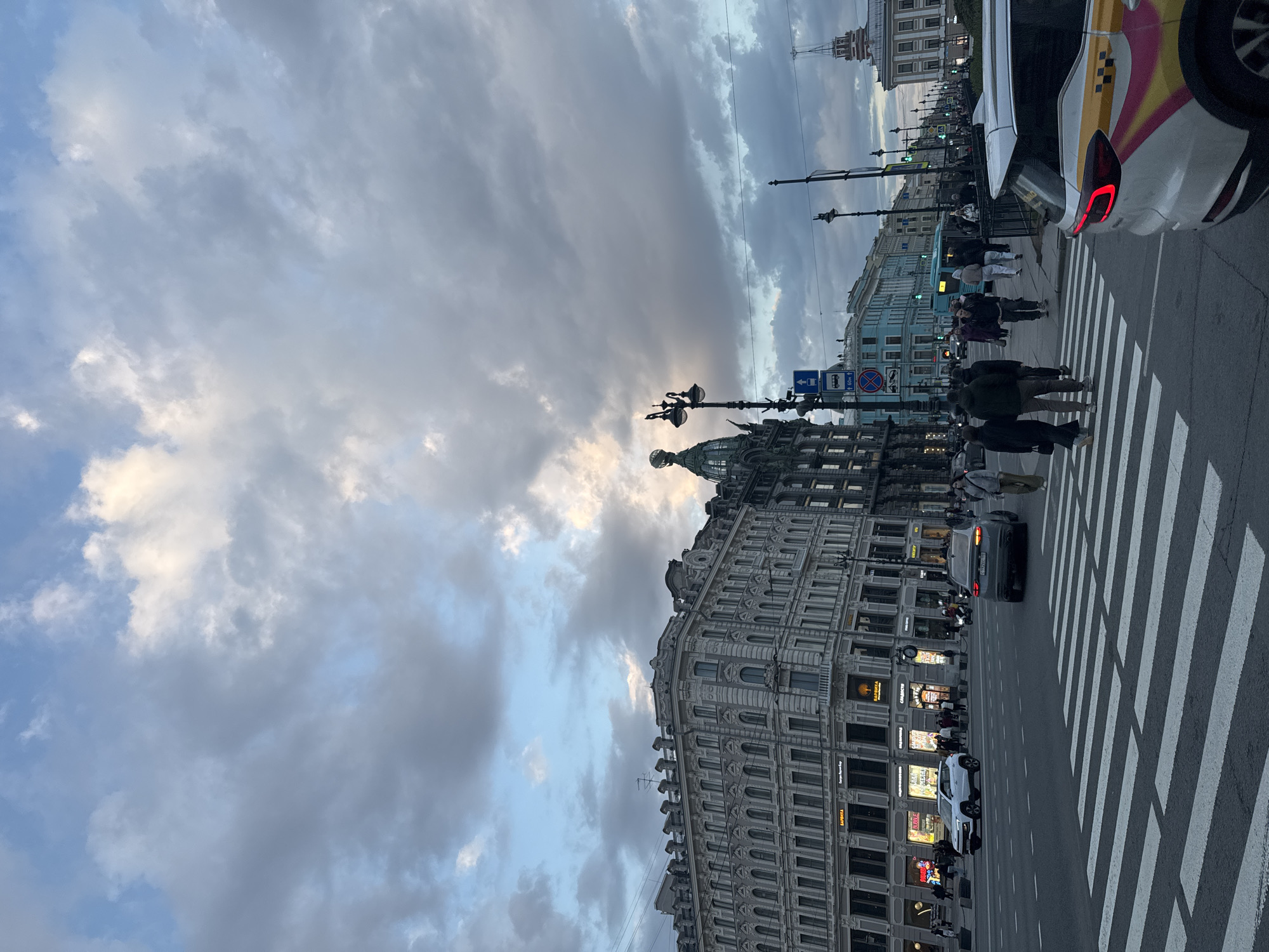 Afternoon street activity documented near Kazan Cathedral, Saint Petersburg