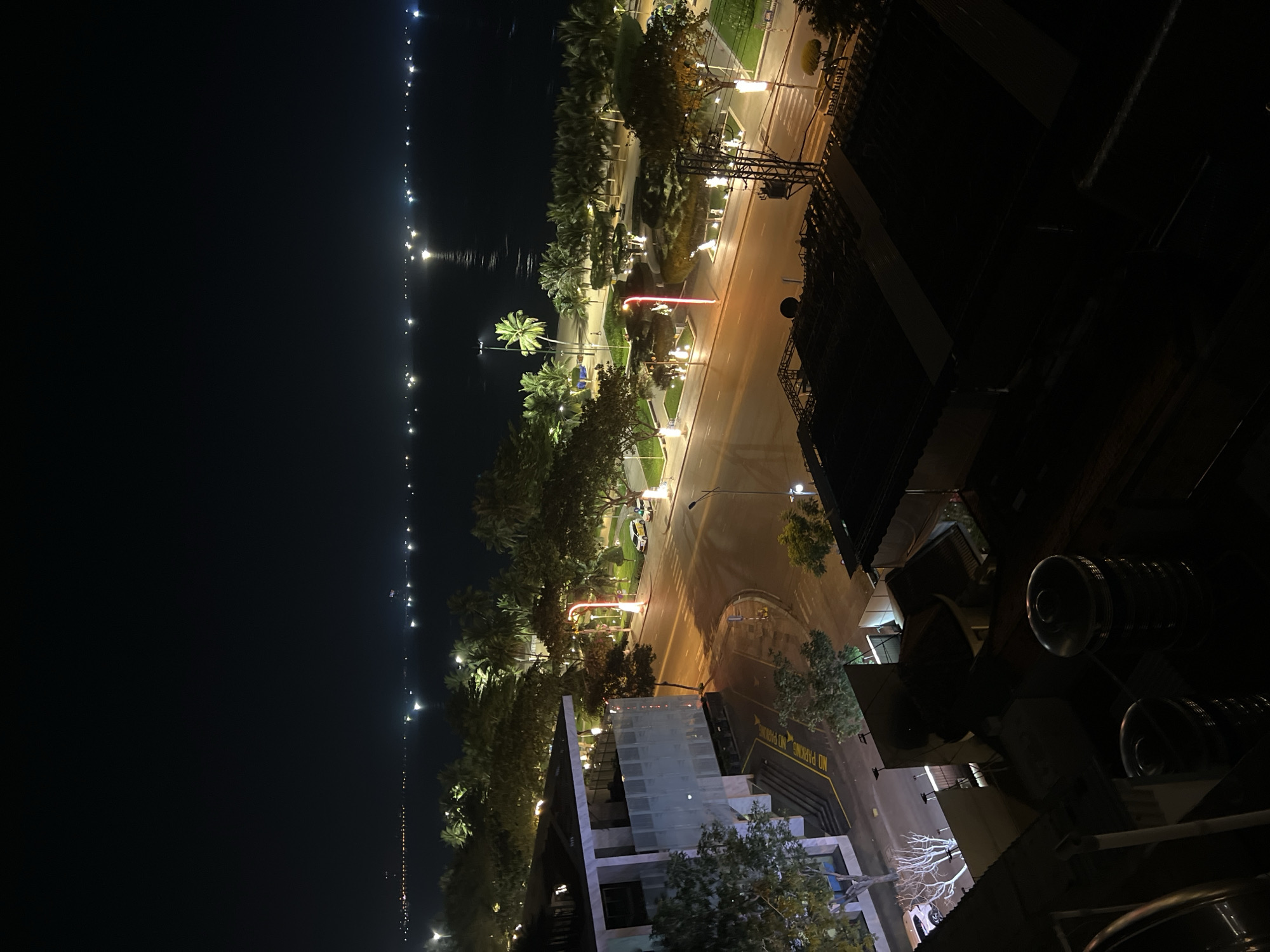 Nha Trang coastal streets alive with traffic and light after dark
