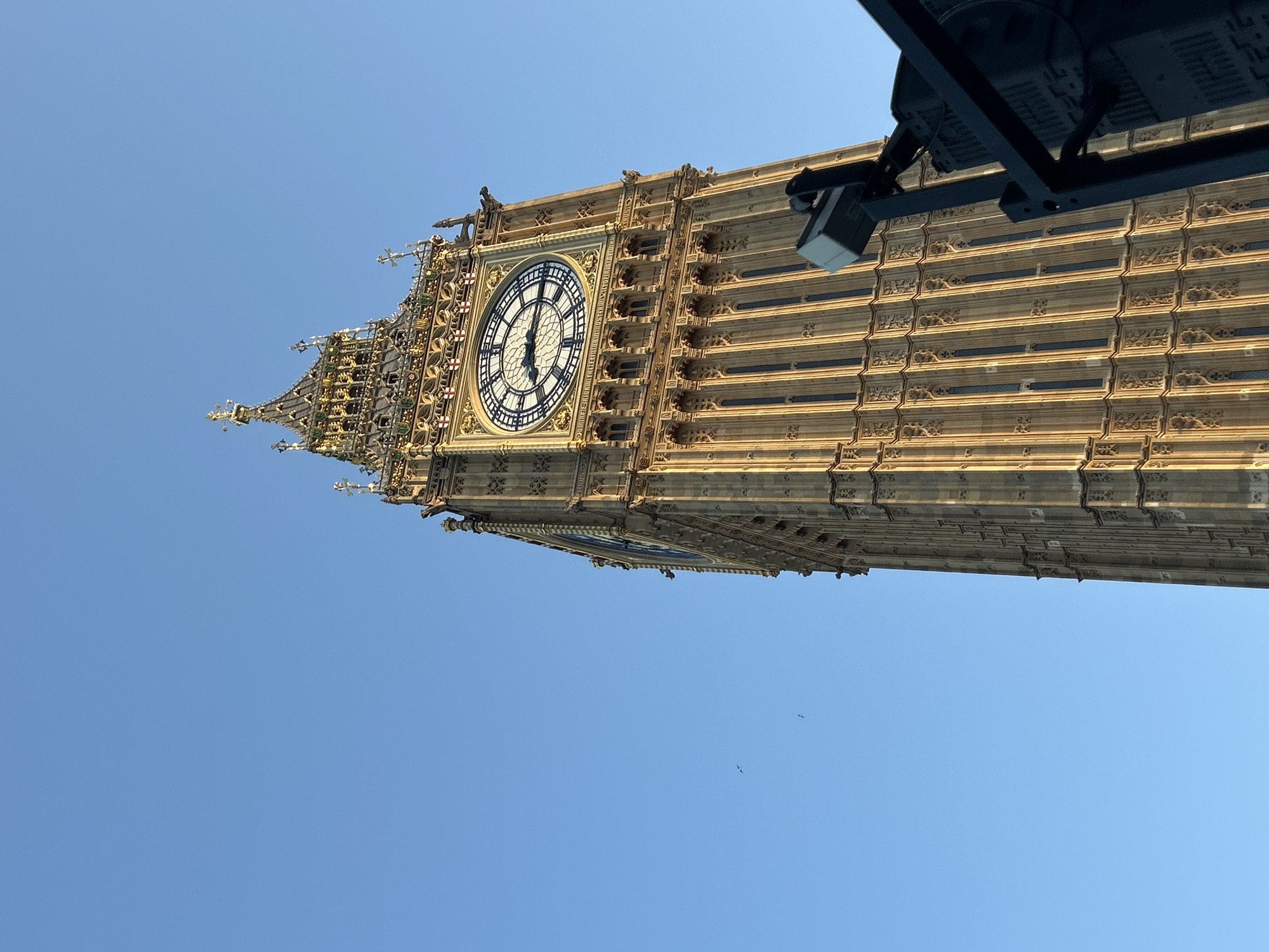Tourist captures Westminster landmarks during London afternoon walkabout