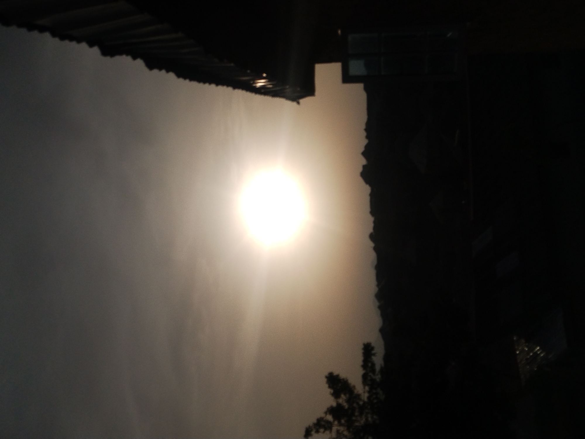 Bright sunrise observed over Jos, Nigeria rooftops