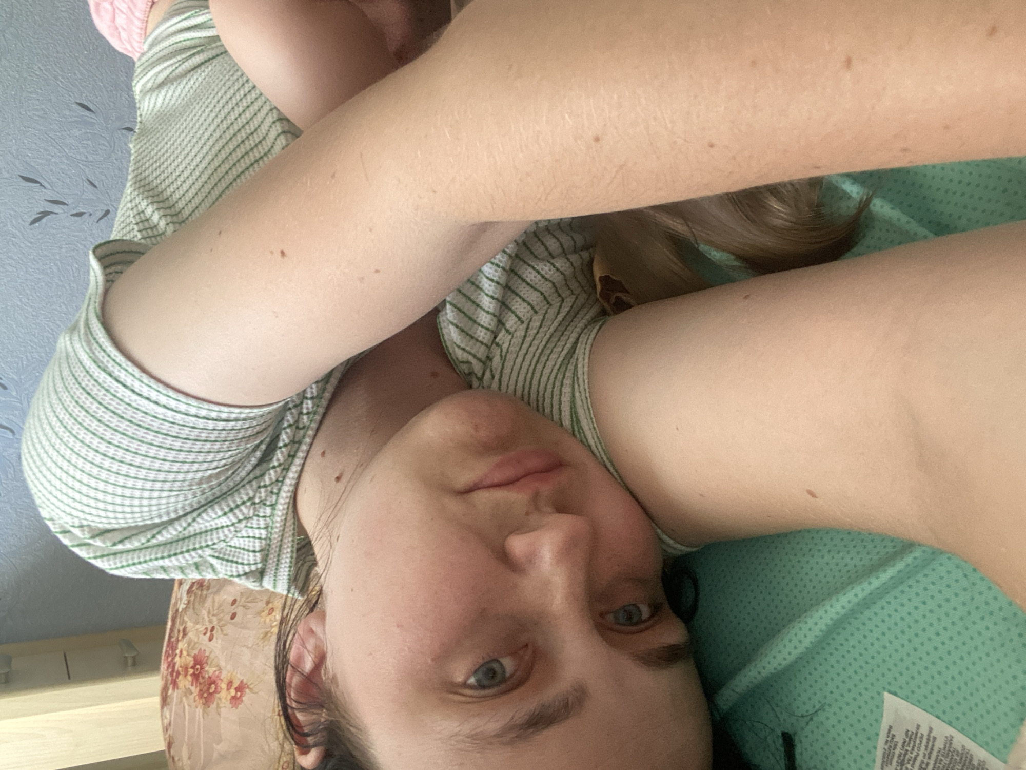Afternoon selfie session at home, green striped shirt throughout