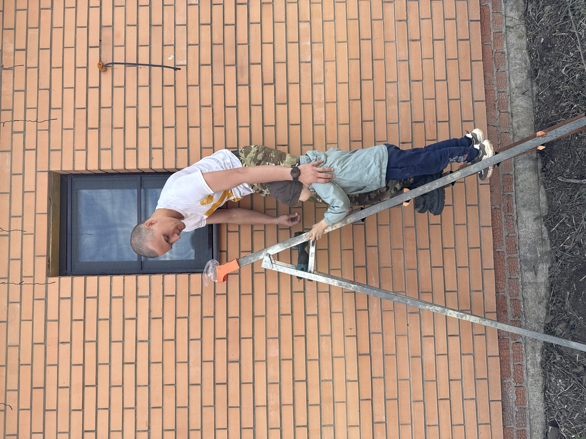 Father and son repair work captured in Chaikovsky, Russia