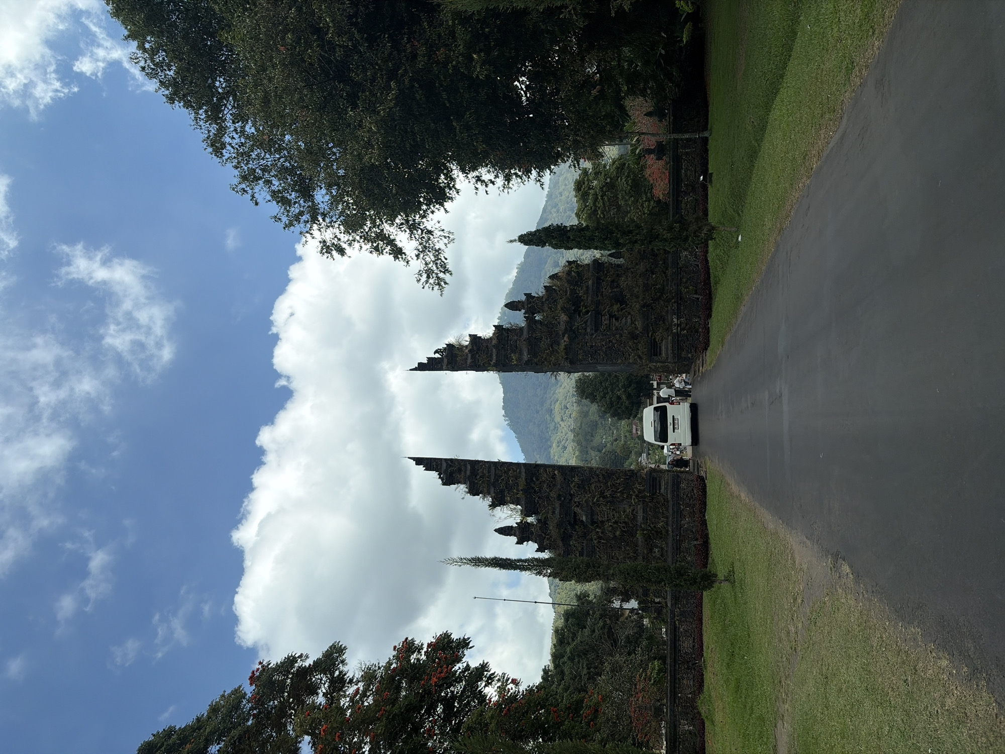 Bali's iconic Handara Gate framed by mountains and green fields