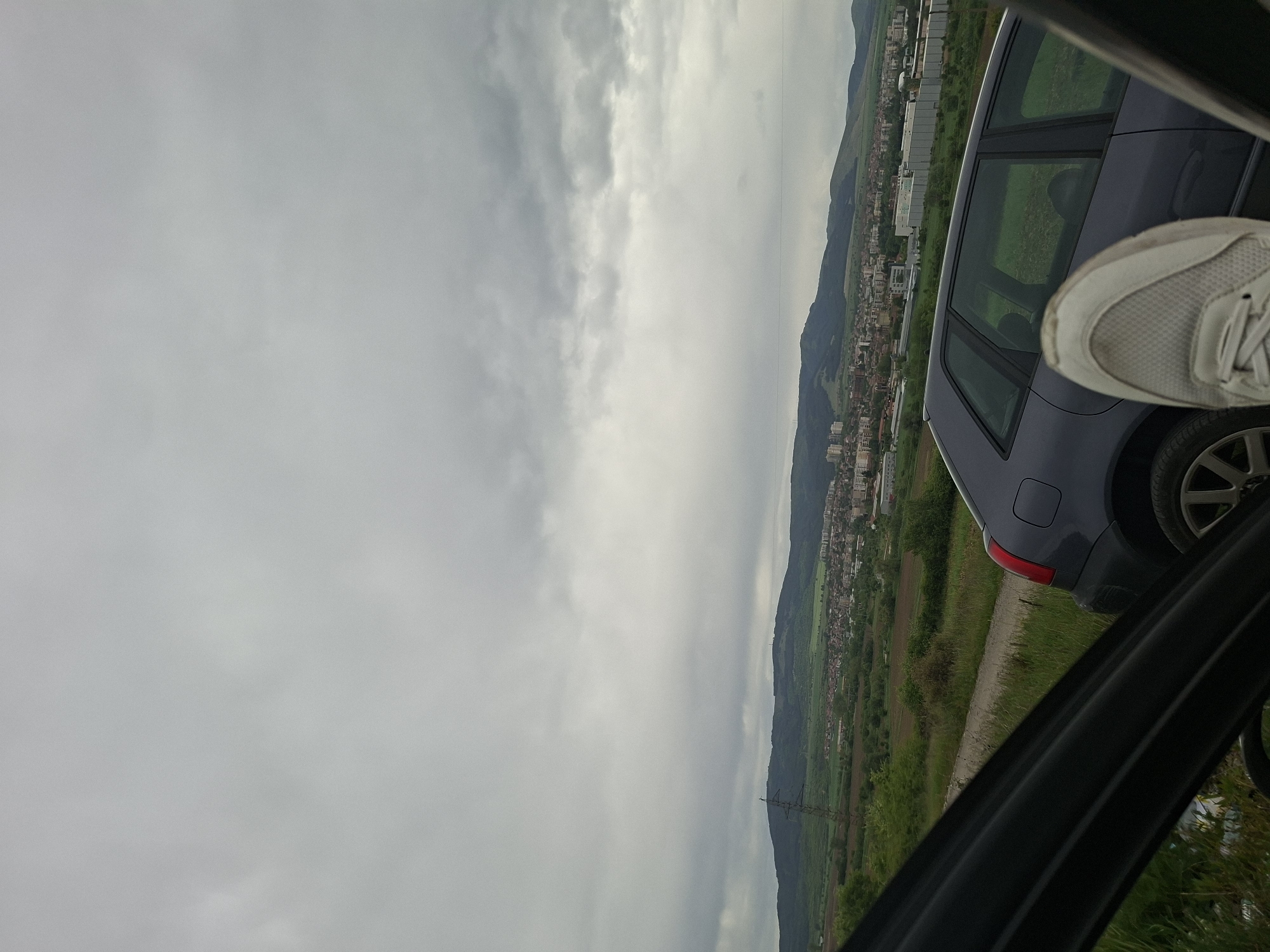 Traveler stops in rural Bulgaria, documents mountain views