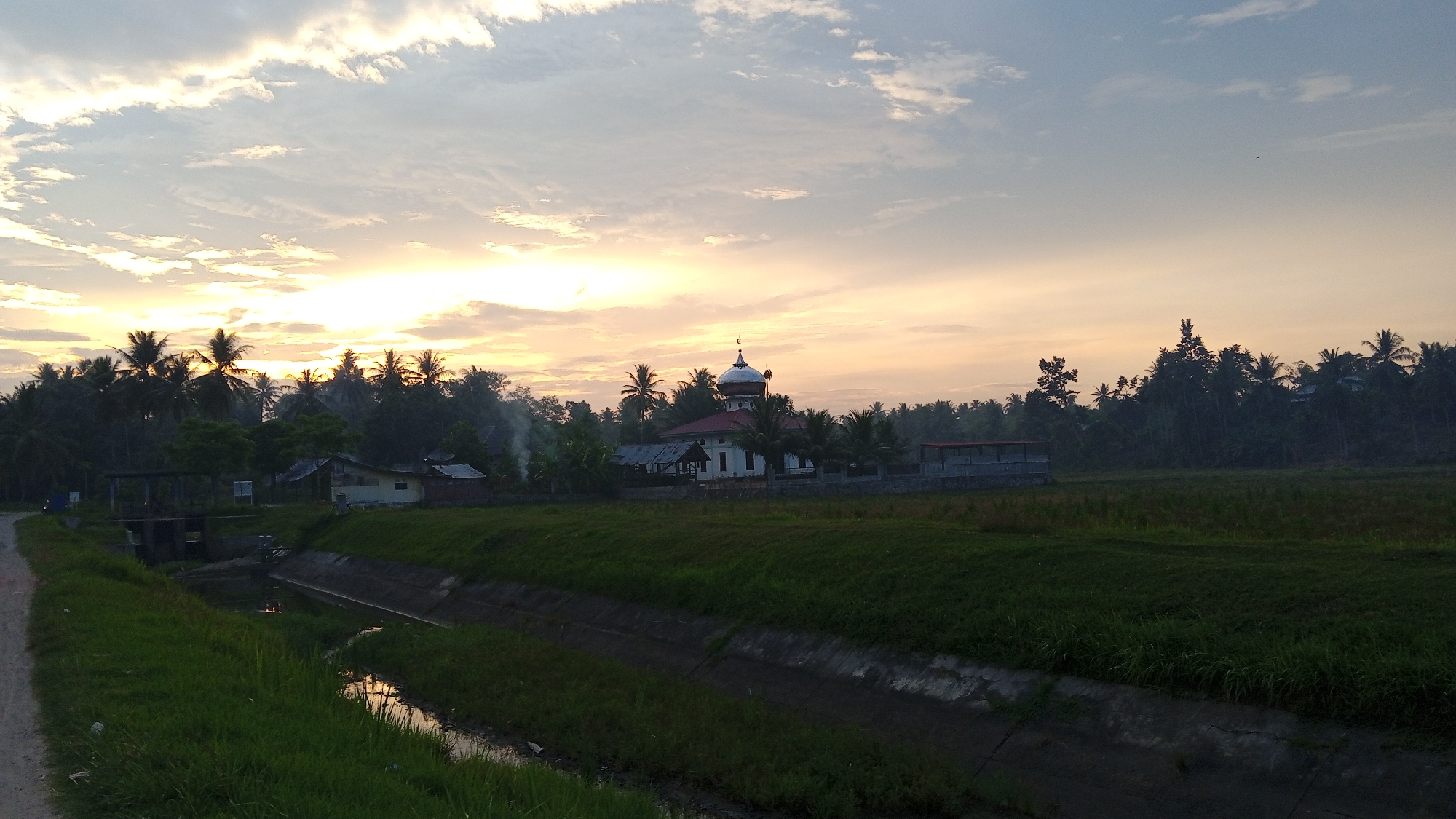 Rural infrastructure and sunset landscapes documented in Blangtingkeum, Indonesia