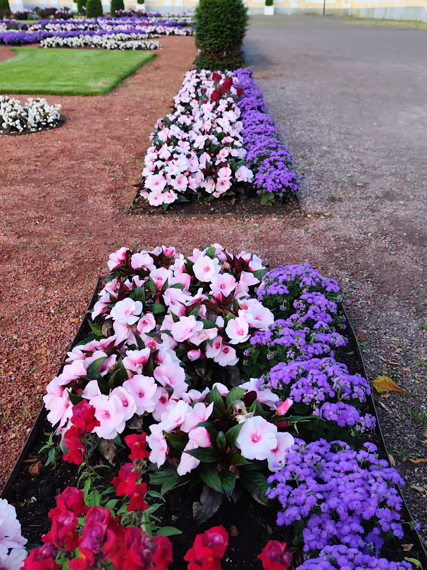 Kadriorg Palace gardens at dusk, flowers and architecture