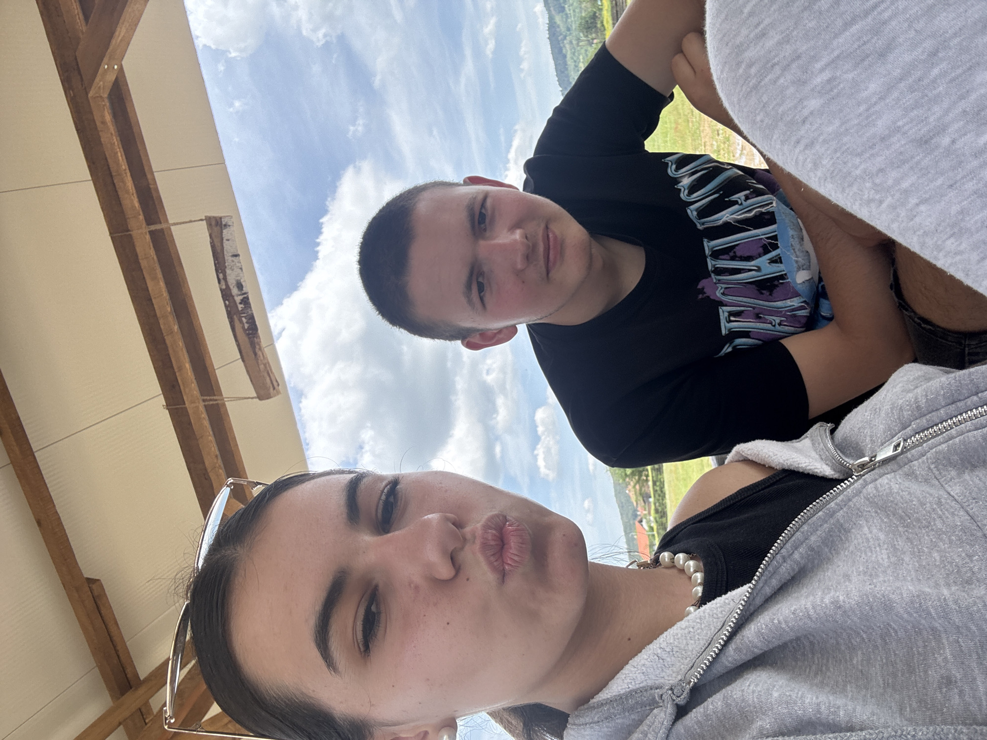 Two people take selfie outdoors in Karavelovo, Bulgaria