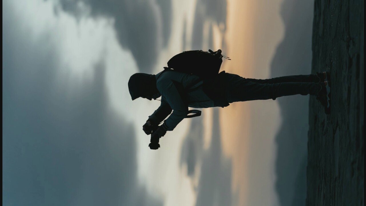 Rocky overlook view meets a fully geared rider on a motorcycle