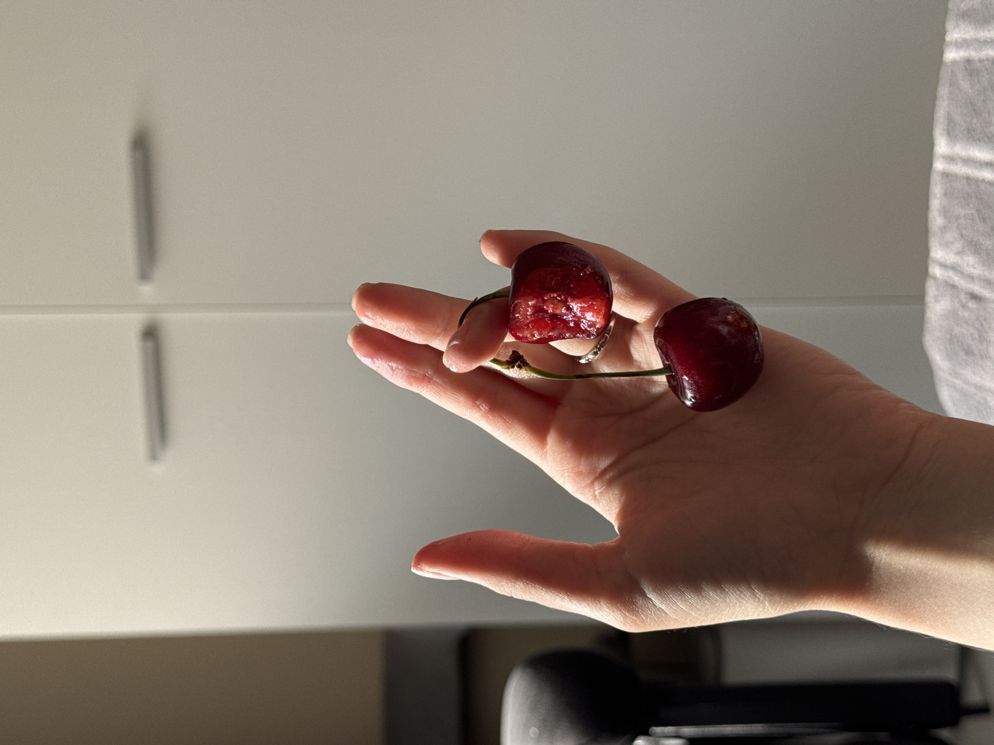Cherries and a skincare haul, arranged on a cozy afternoon