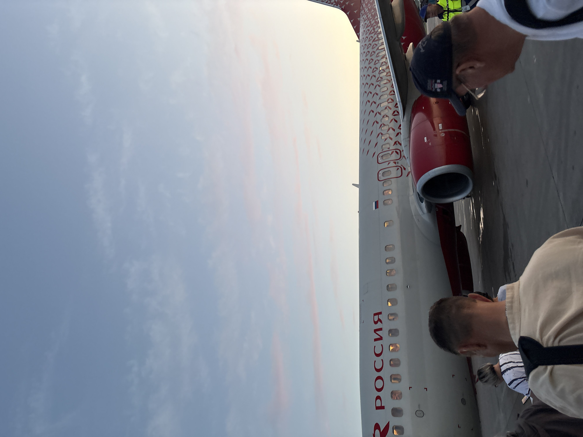 Rossiya Airlines flight activity at Perm's Bolshoye Savino Airport at sunset