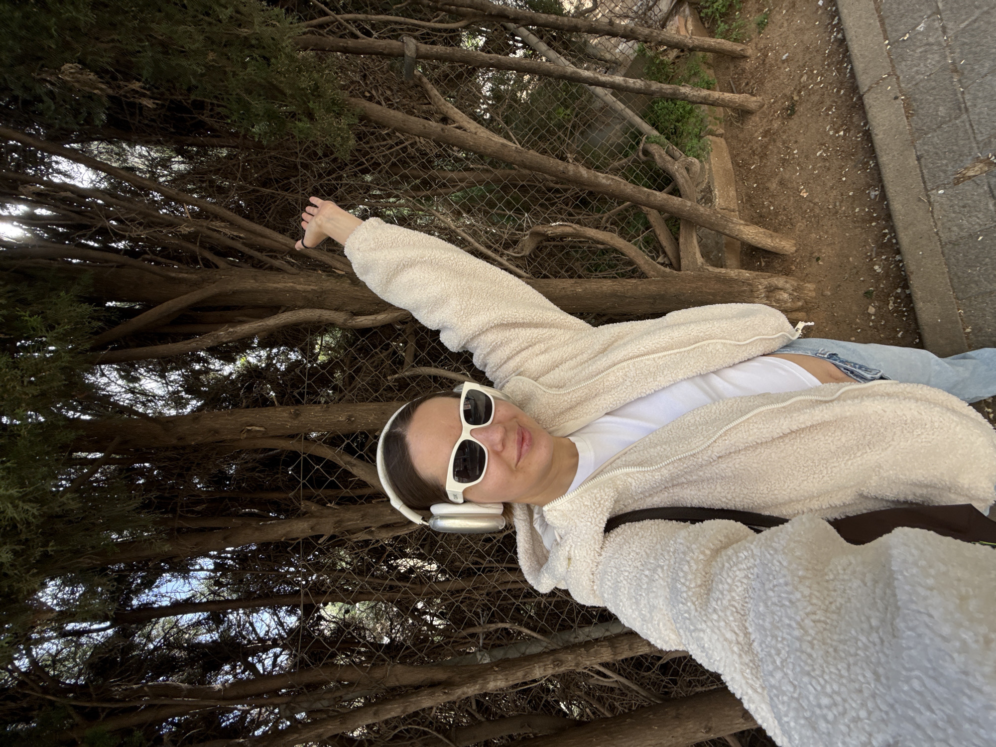 Woman takes selfie in Barcelona urban setting