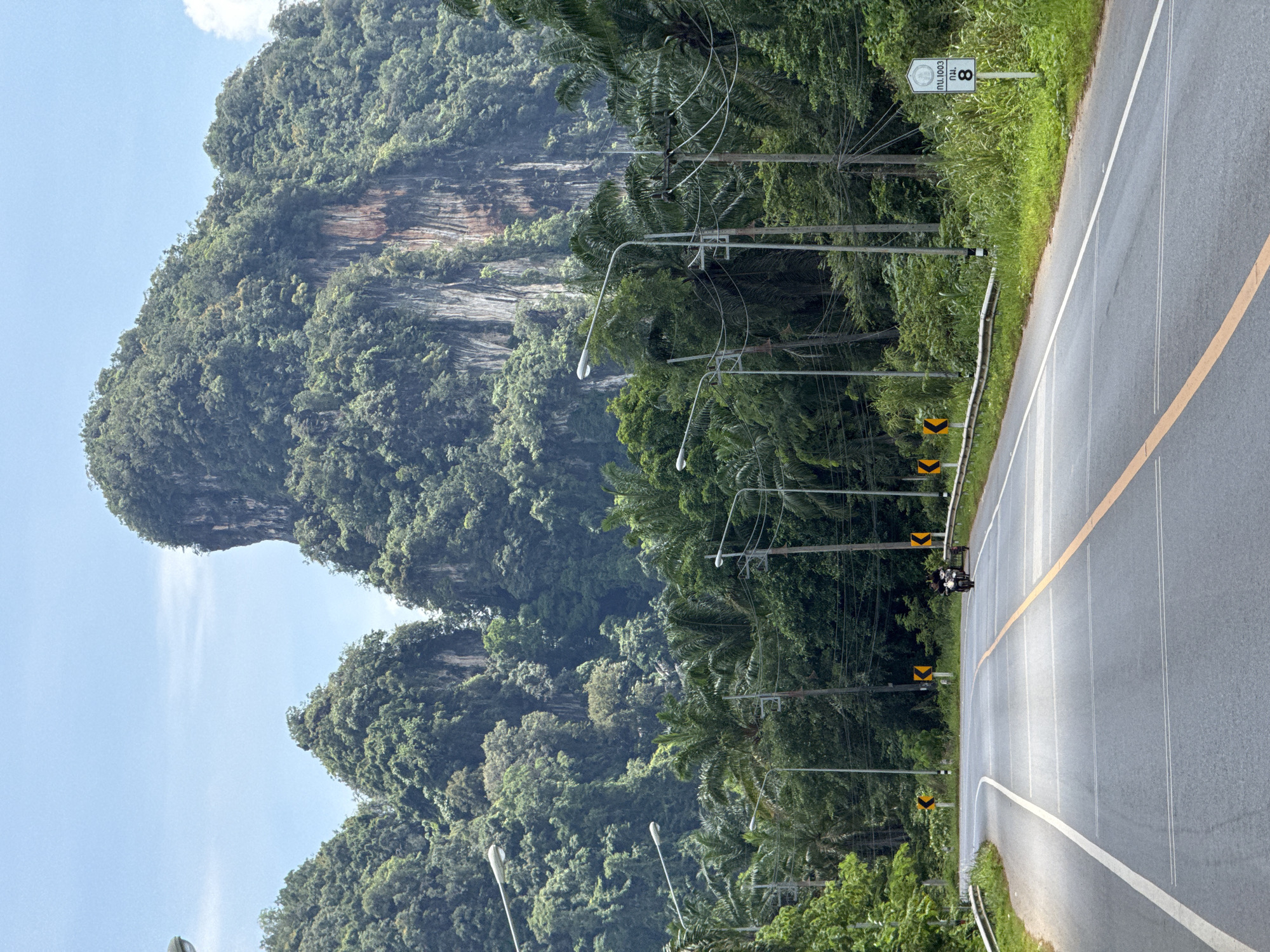 Motorcycles on a karst mountain road in southern Thailand