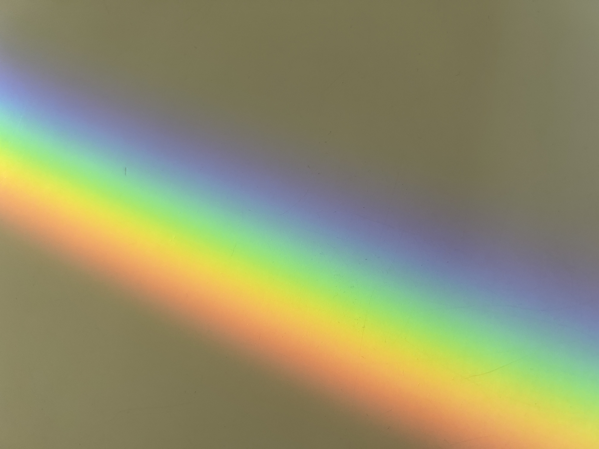 Rainbow spectrum appears on surface in Spanish town