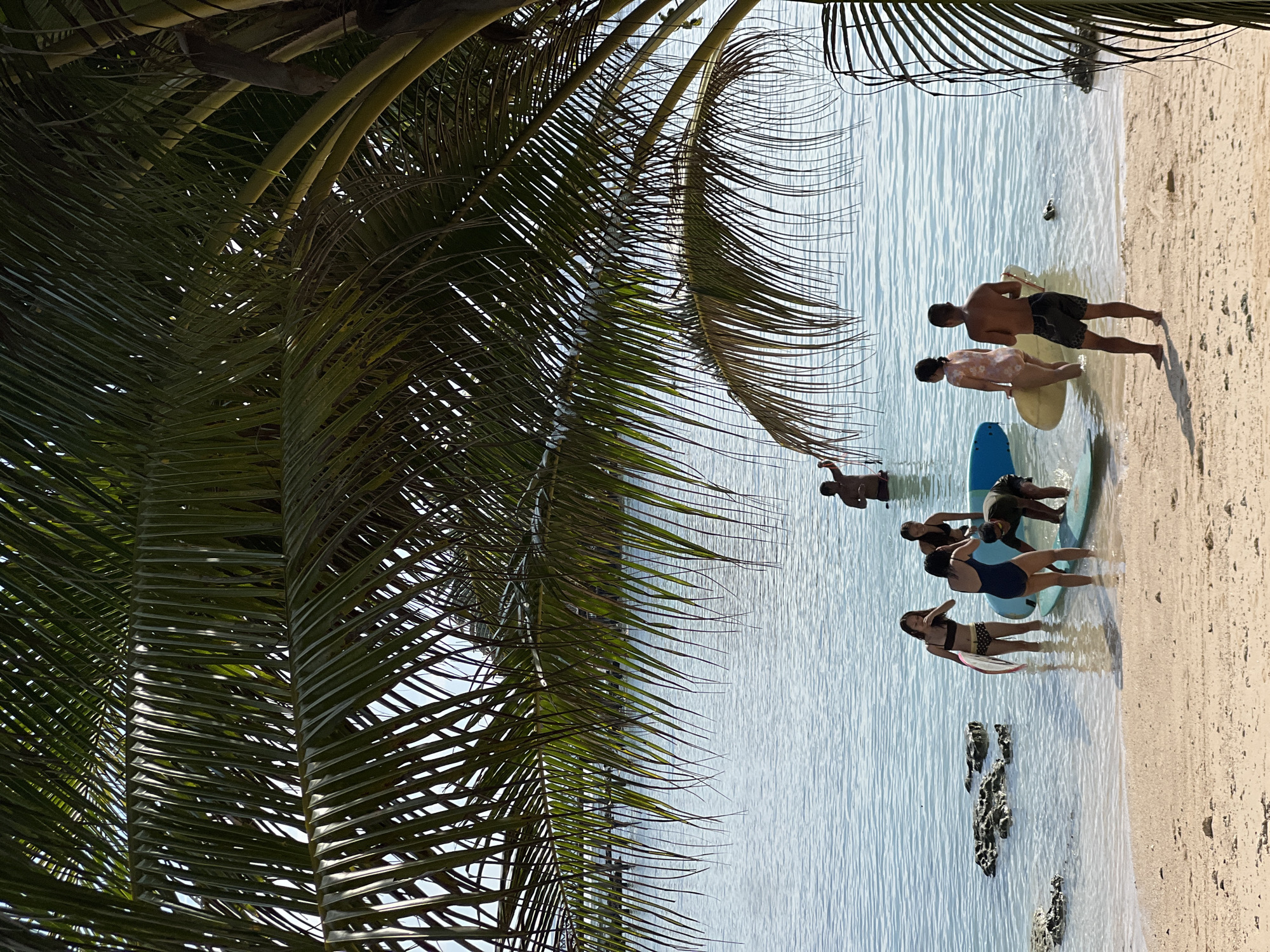 Drone and surf culture collide on a sunny Siargao beach