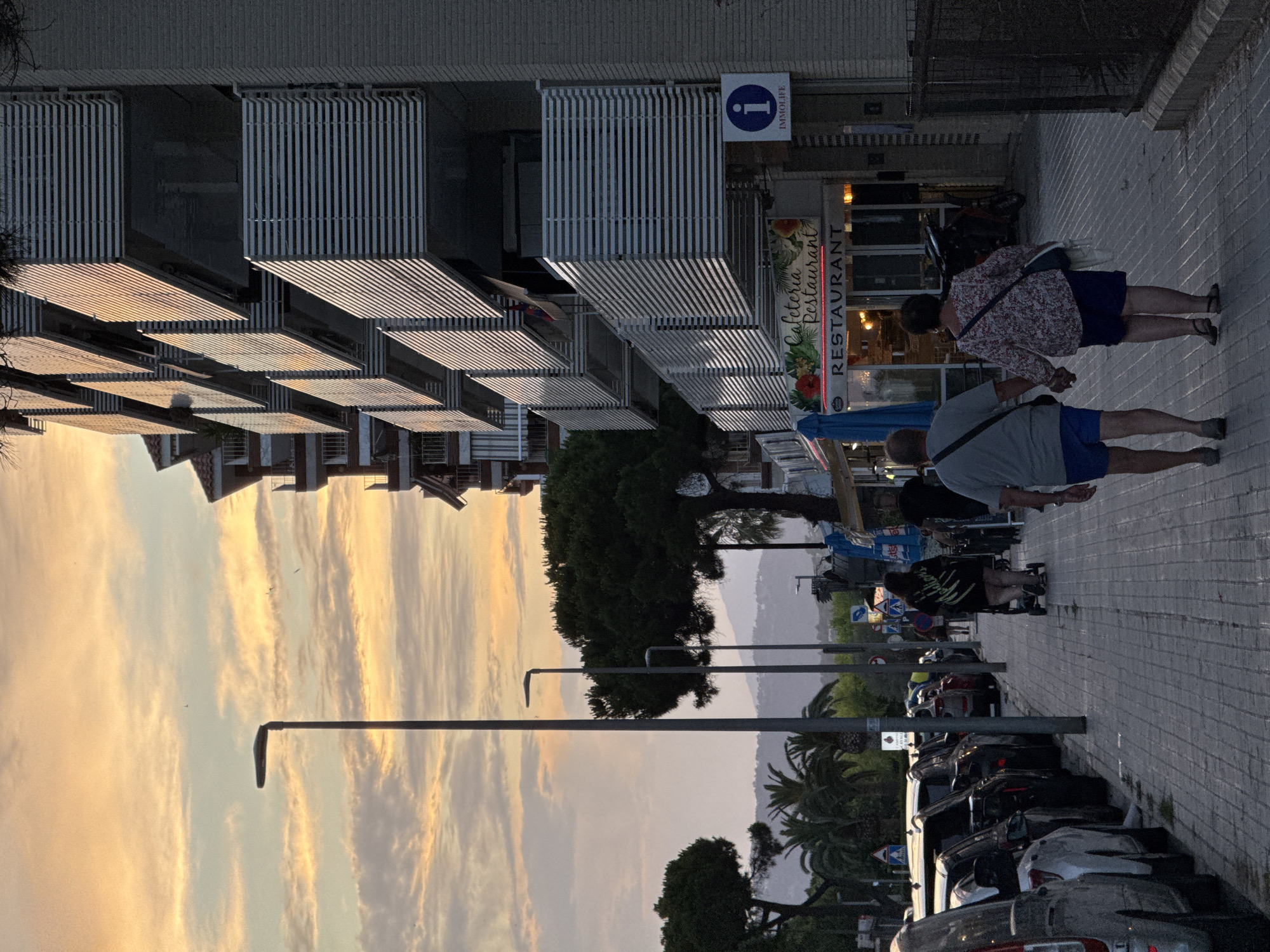 Sunset evening along the Blanes promenade and streets