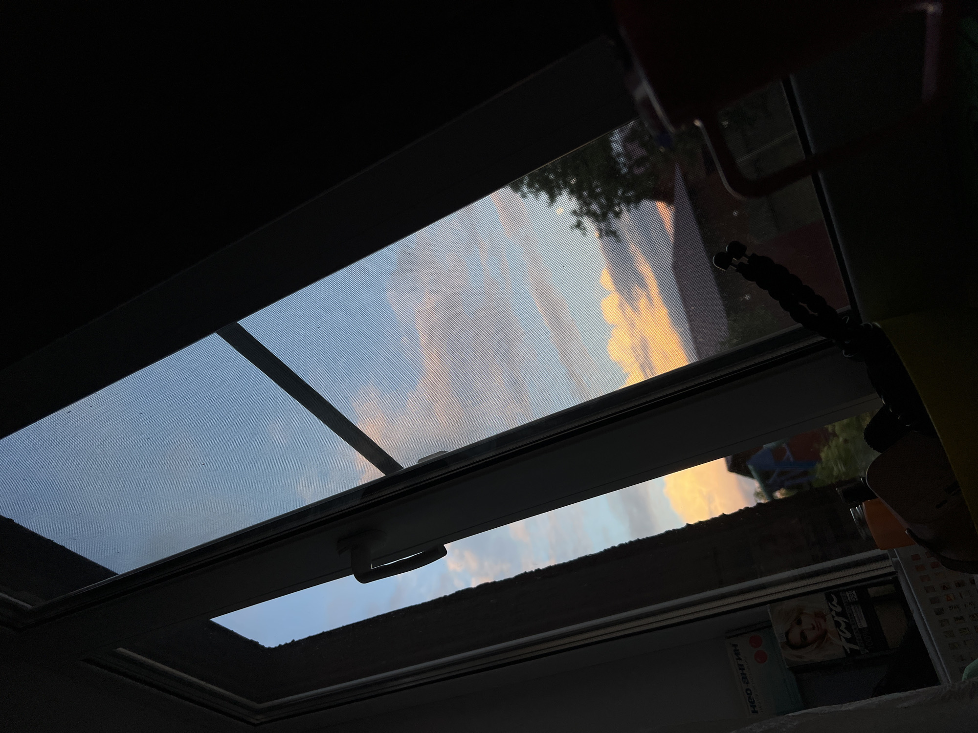 Sunset sky views through windows in Afanasyevo, Russia