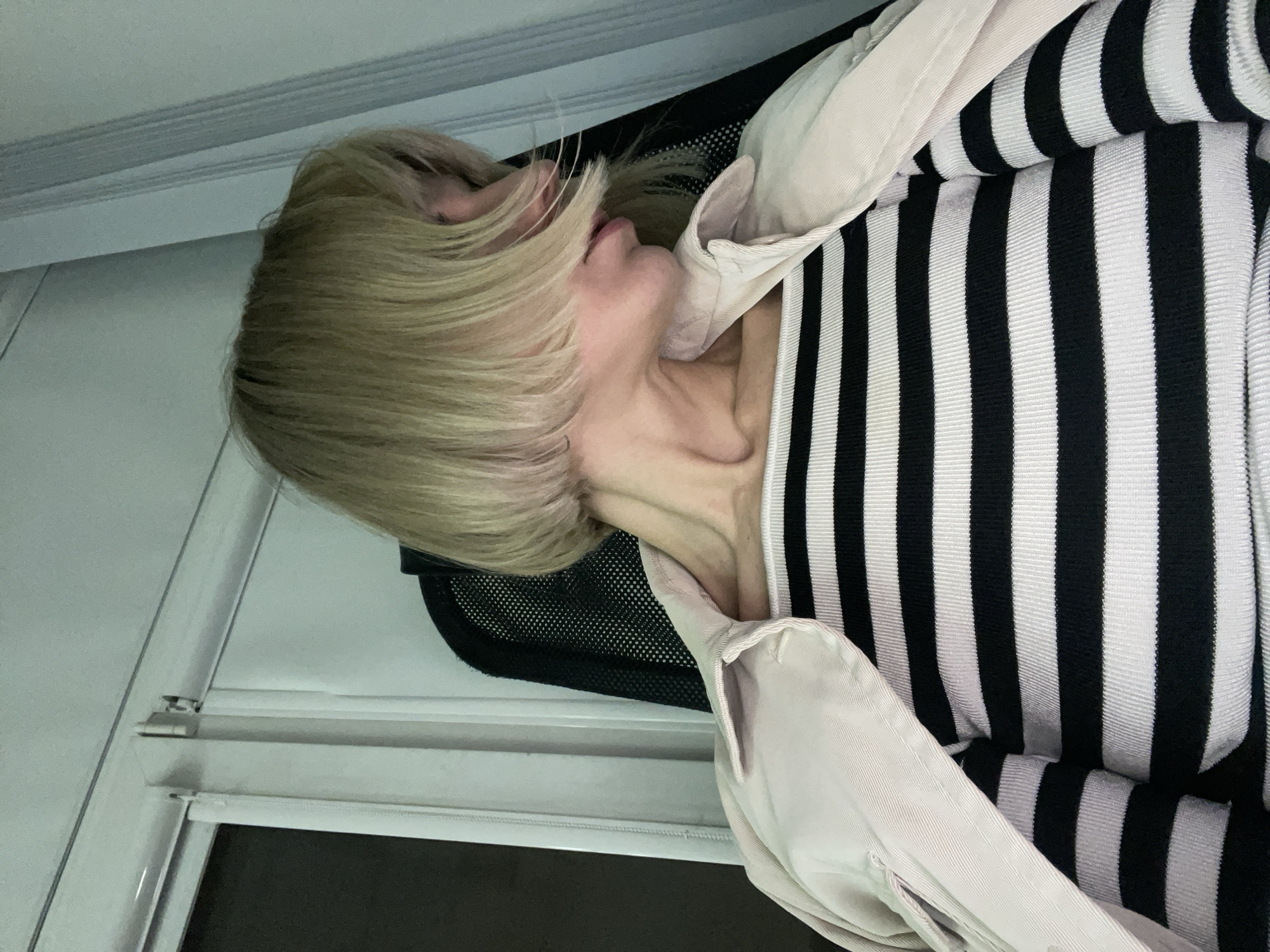 Person relaxes indoors in Moscow apartment setting
