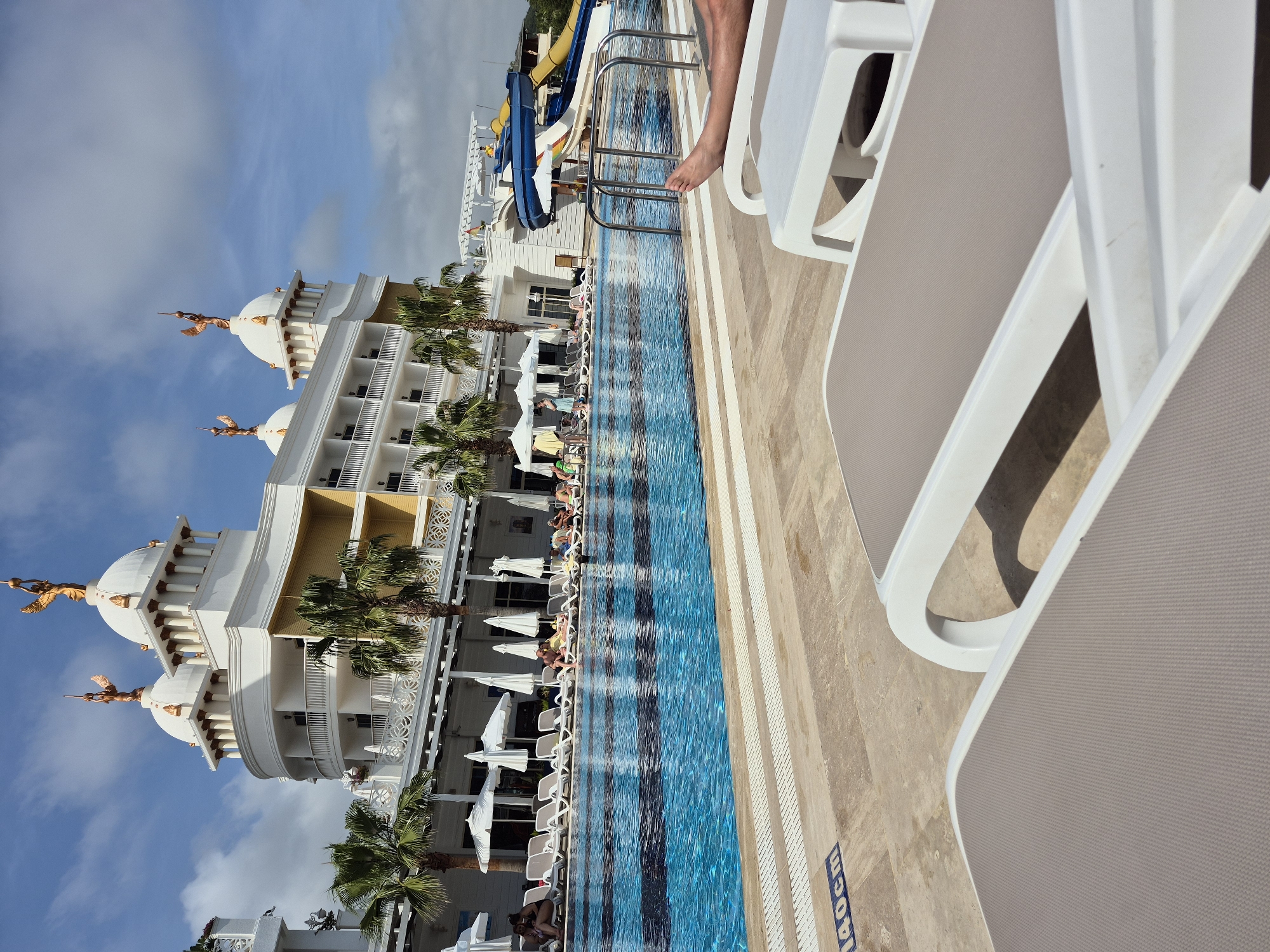 Resort pool and hotel exterior observed in Alanya, Turkey